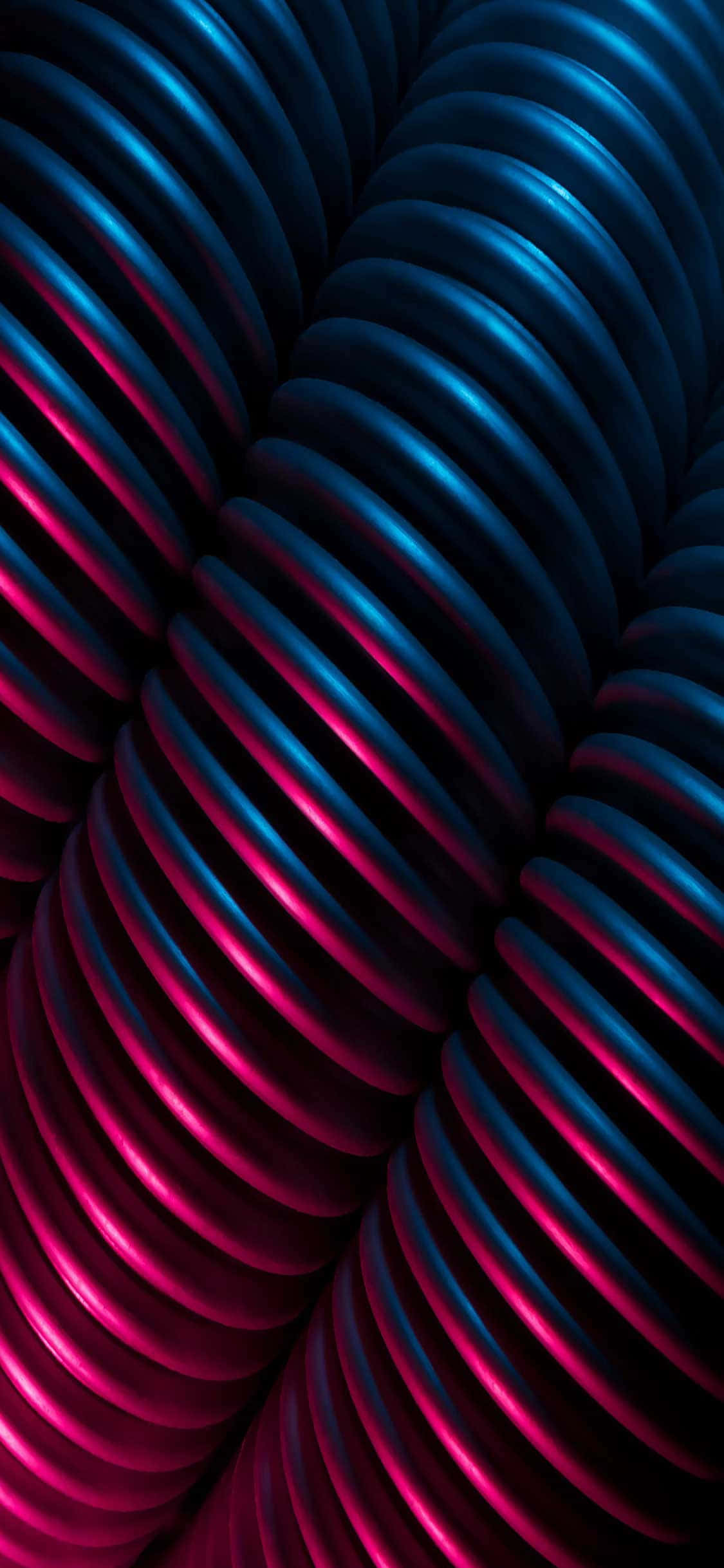 iPhone X 桌布 壁紙 — 充滿活力的霓虹粉紅和電光藍色發光絲帶彎曲成催眠般的重複螺旋圖案。