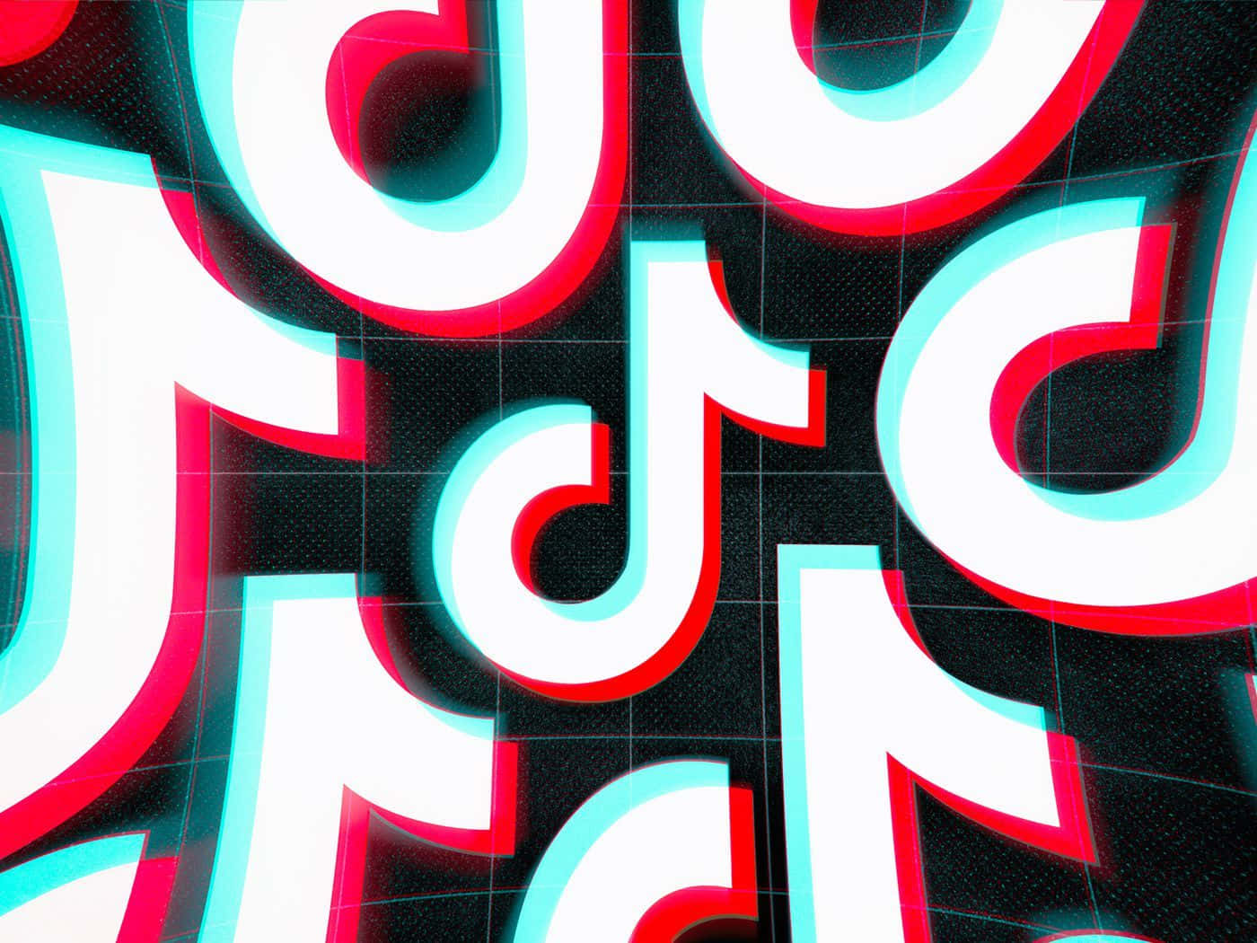 TikTok Icon 桌布 壁紙 — 充滿活力的霓虹紅色和青色TikTok標誌漂浮在帶有發光邊緣的暗色網格背景上。