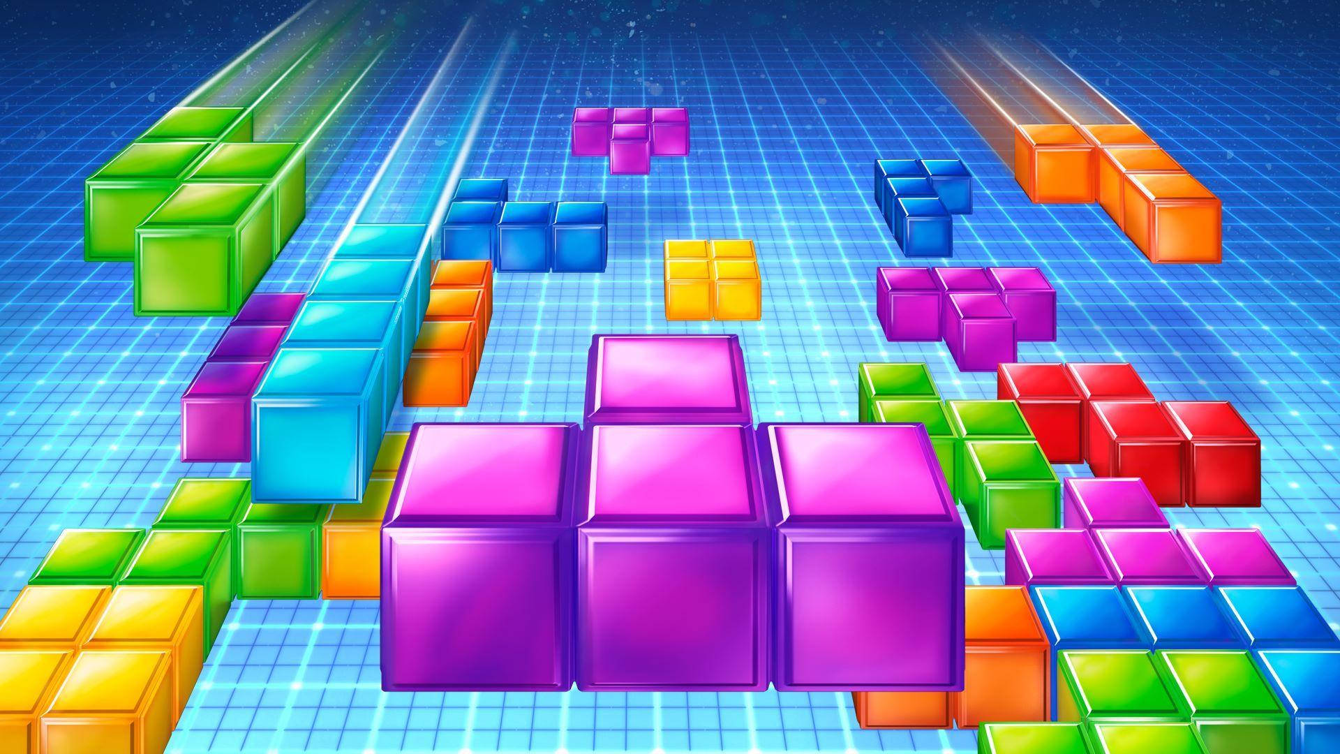 game 桌布 壁紙 — 充滿活力的霓虹色俄羅斯方塊在動態光束下沿著發光的藍色網格傾瀉而下。
