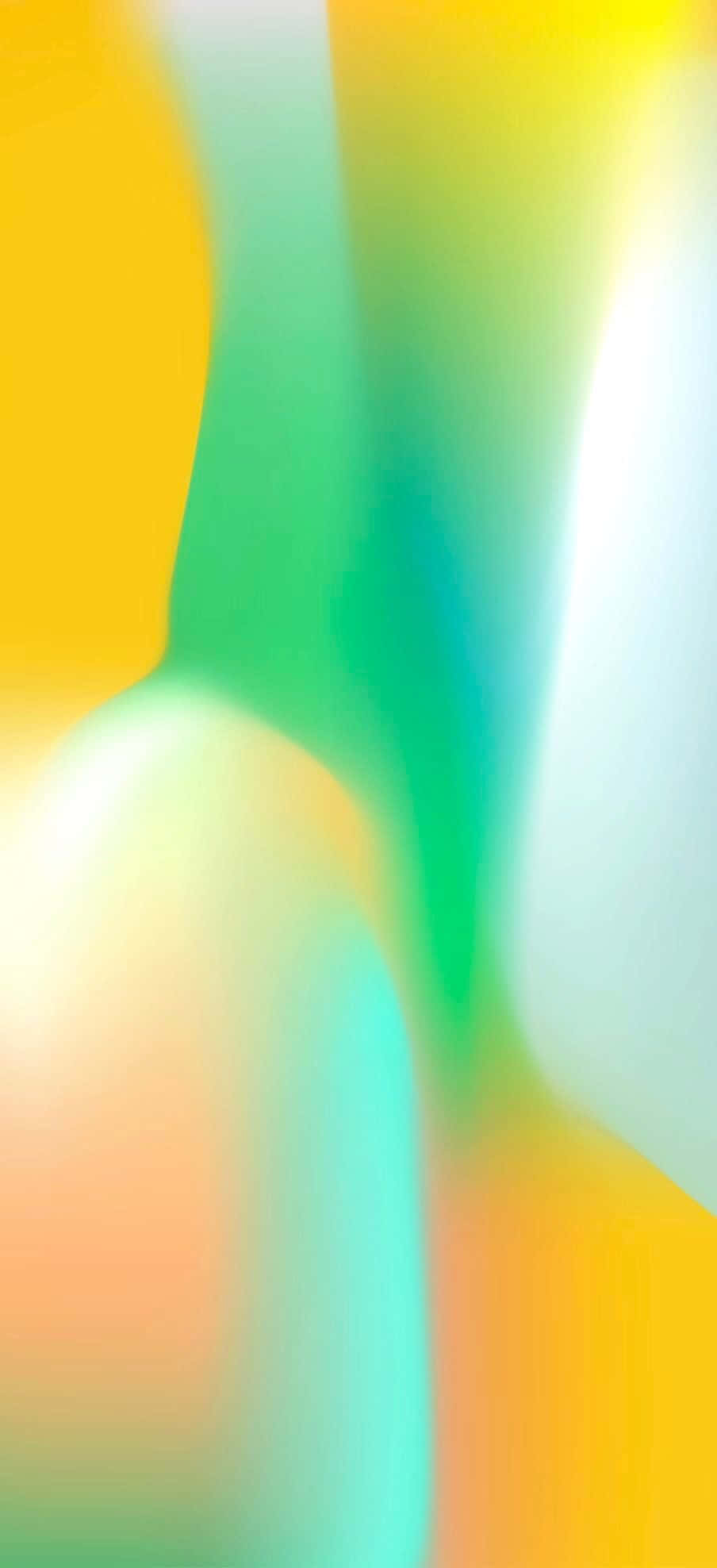 Green And Yellow 桌布 壁紙 — 充滿活力的黃色、綠色和藍綠色抽象漸變流，帶有柔和模糊的過渡，營造出動感多彩的背景。