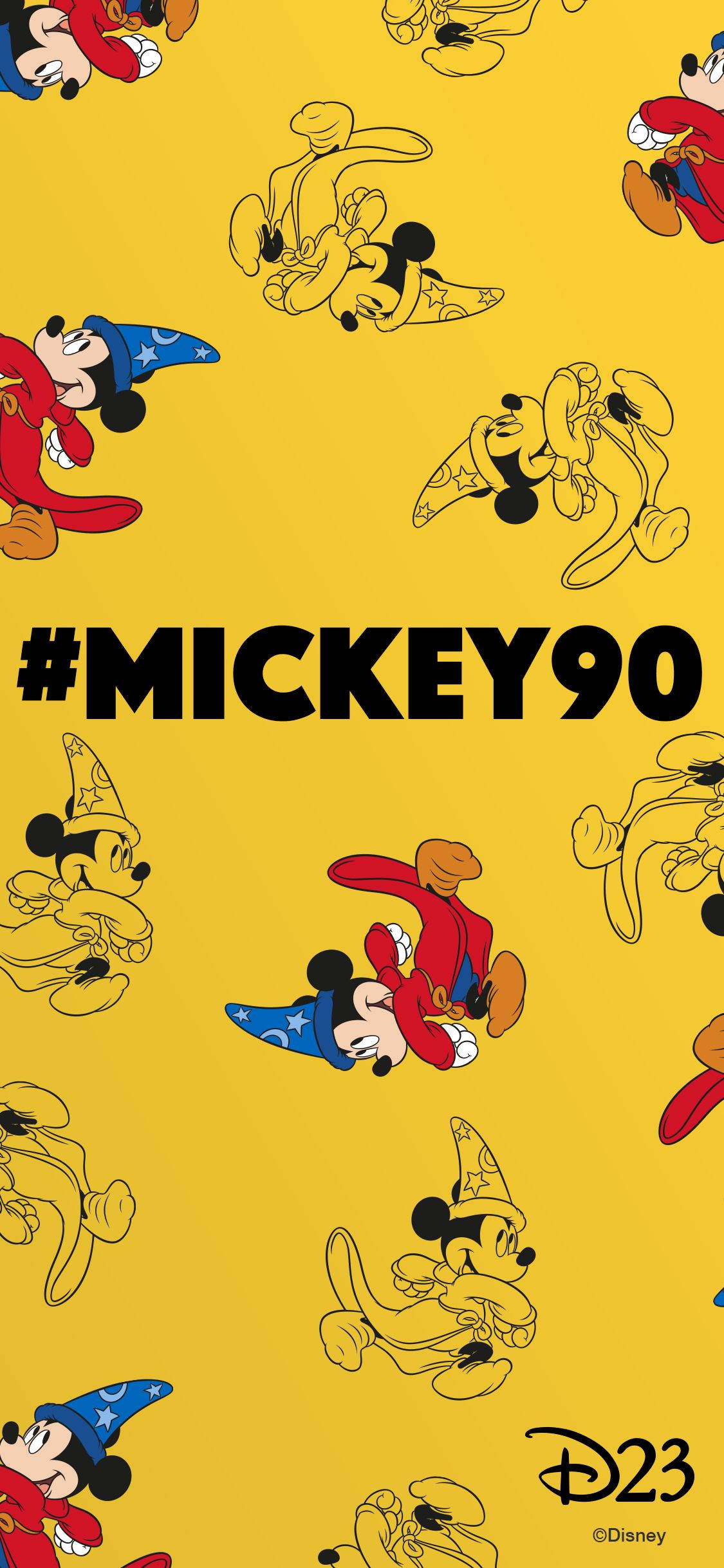 Mickey 桌布 壁紙 — 充滿活力的黃色壁紙，上面有頑皮的米奇老鼠和高飛穿著巫師服裝散落在框架上。