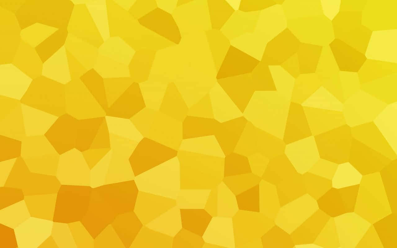 Yellow Geometric 桌布 壁紙 — 充滿活力的黃色抽象圖案，由不規則的多邊形形狀和柔和漸變組成。