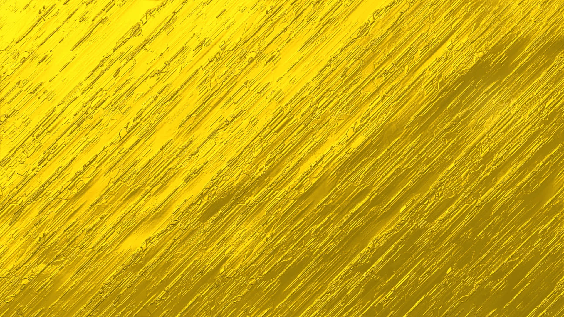設計 桌布 壁紙 — 充滿活力的黃色紋理背景，帶有對角線筆觸圖案，營造出動態的抽象表面。