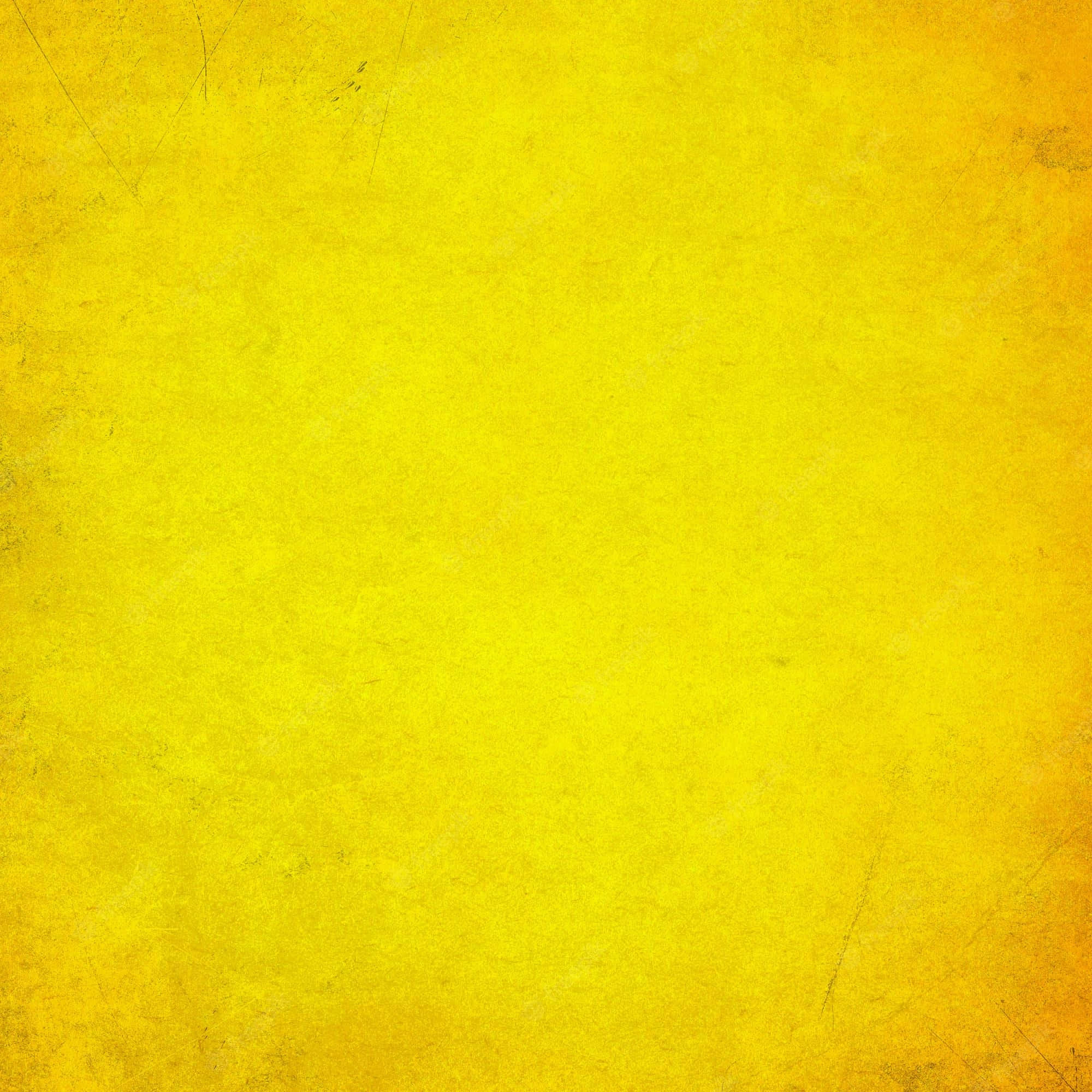 Yellow Grunge 桌布 壁紙 — 充滿活力的黃色紋理背景，帶有細微刮痕和復古磨損。