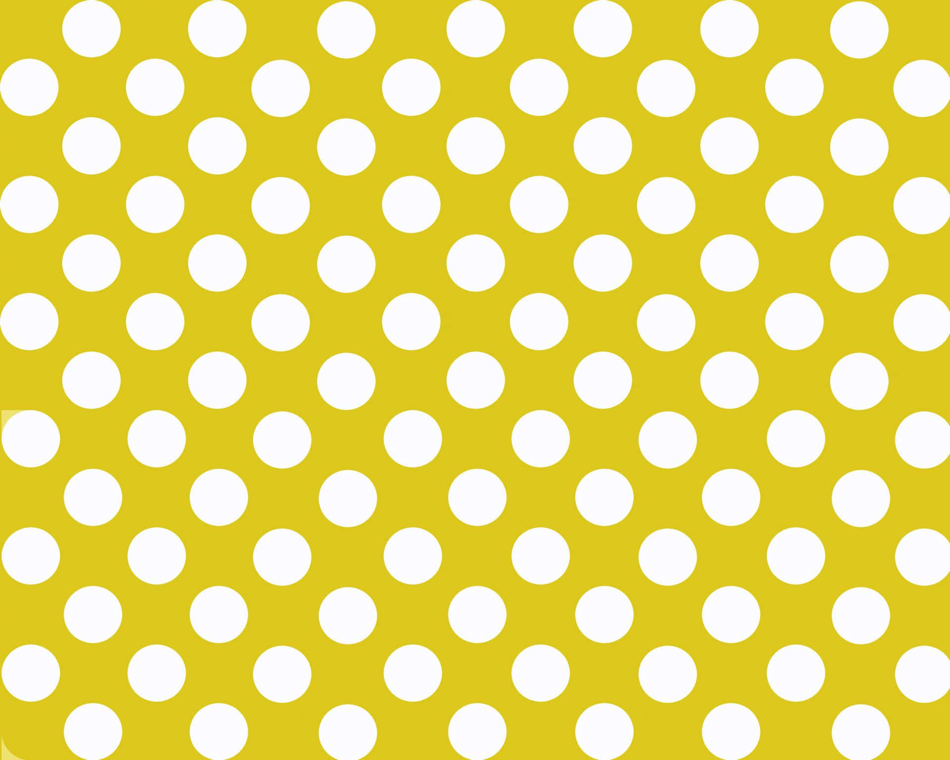 Yellow Polka Dot 桌布 壁紙 — 充滿活力的黃色背景，均勻分佈著白色圓點，形成歡快的重複圖案。