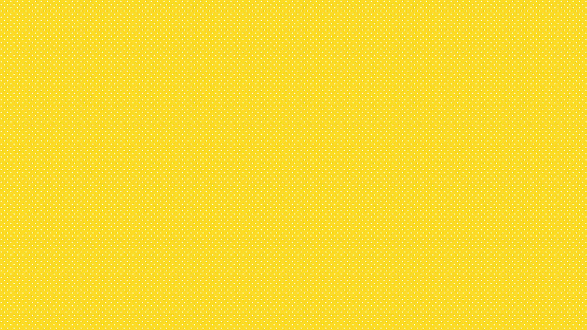 Plain Yellow 桌布 壁紙 — 充滿活力的黃色背景，帶有微妙的重複圓點圖案，營造出歡快的極簡紋理。