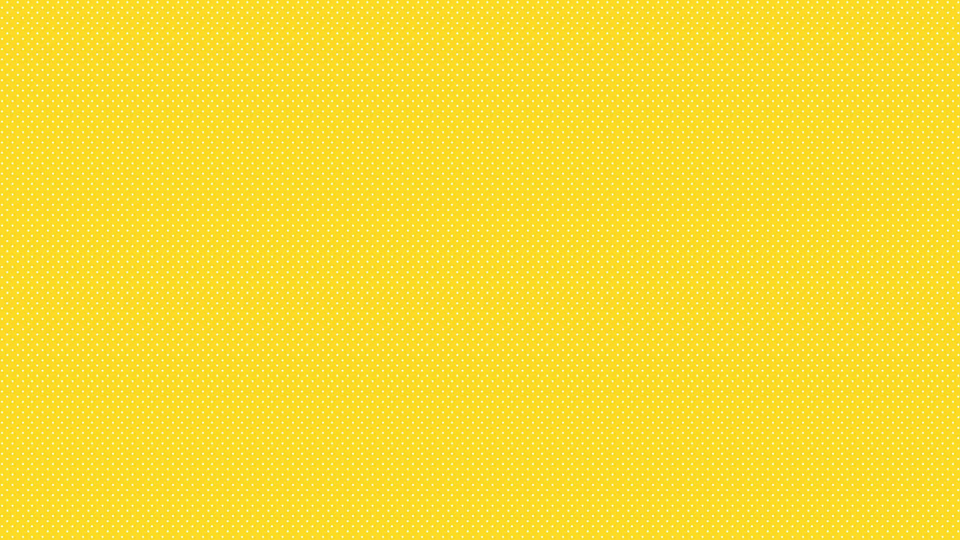 Plain Yellow 桌布 壁紙 — 充滿活力的黃色背景，帶有微妙的重複圓點圖案，營造出歡快簡約的視覺紋理。