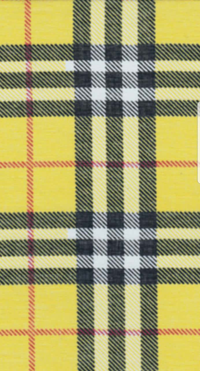 Plaid 桌布 壁紙 — 充滿活力的黃色蘇格蘭格紋布料，帶有醒目的黑色、白色和紅色條紋，呈現經典的格子圖案。
