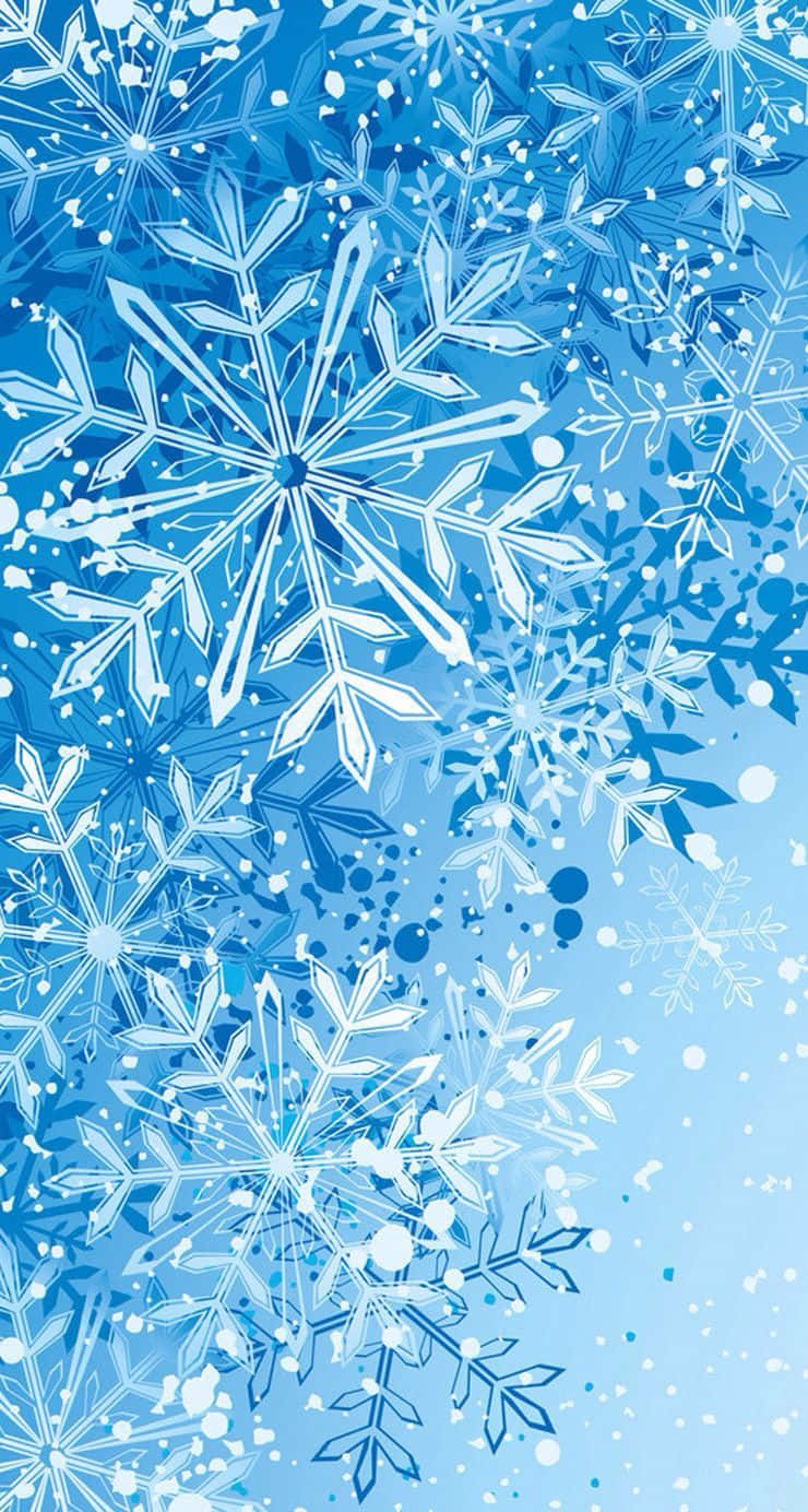 帶有白色雪花圖案和霜凍斑點的藍色背景。 — 雪花 GIF 壁紙