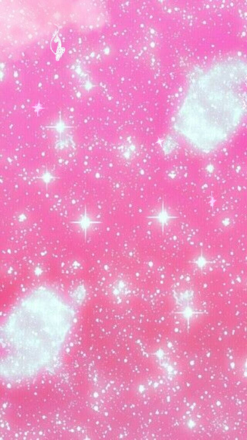 Y2K 美學 桌布 壁紙 — 充滿閃爍星星和發光星雲的充滿活力的粉紅色宇宙場景，營造出夢幻般的天體氛圍。