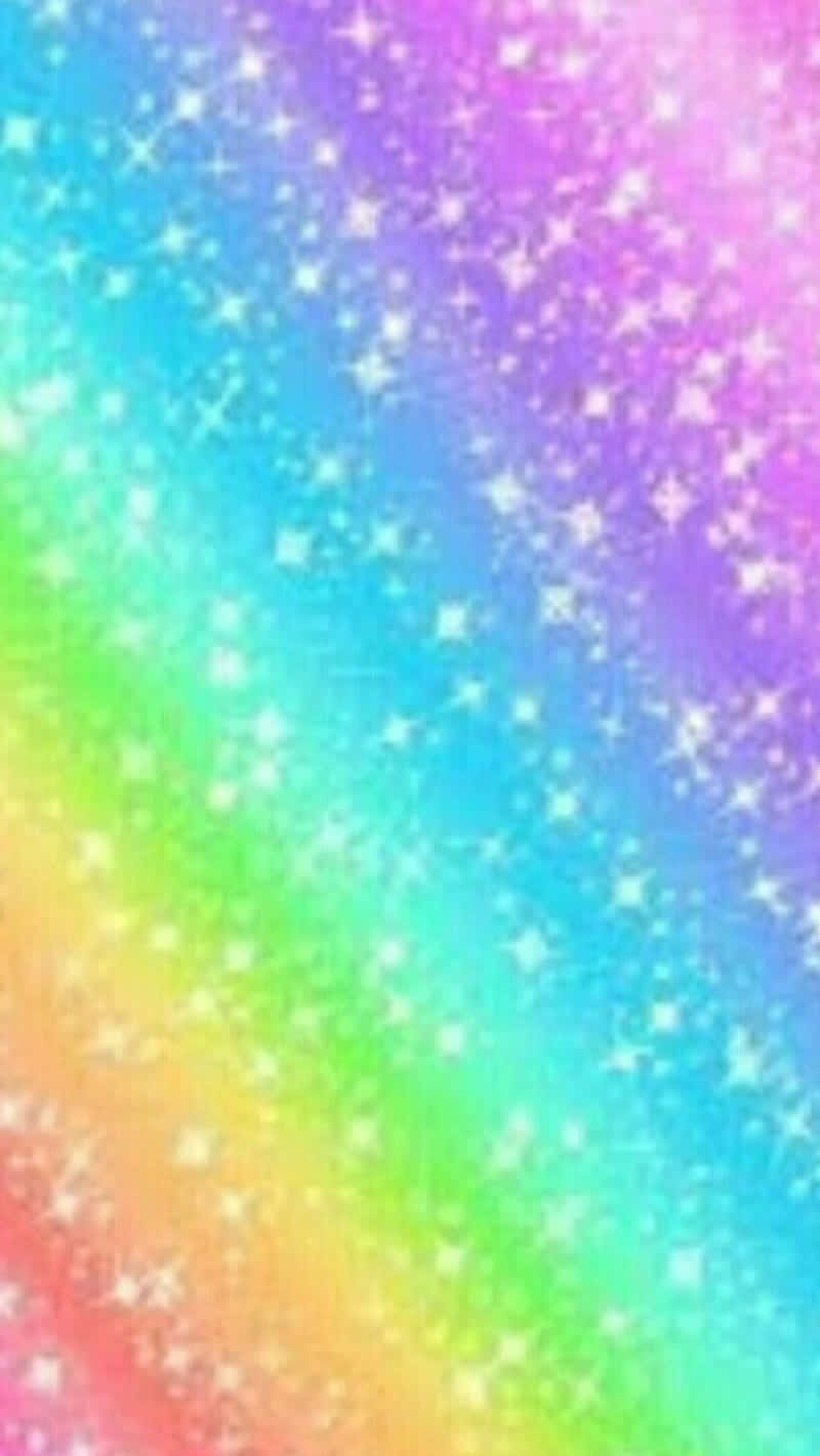 Rainbow Glitter 桌布 壁紙 — 充滿閃爍白色星星的鮮豔彩虹漸變天空，營造出神奇的宇宙效果。