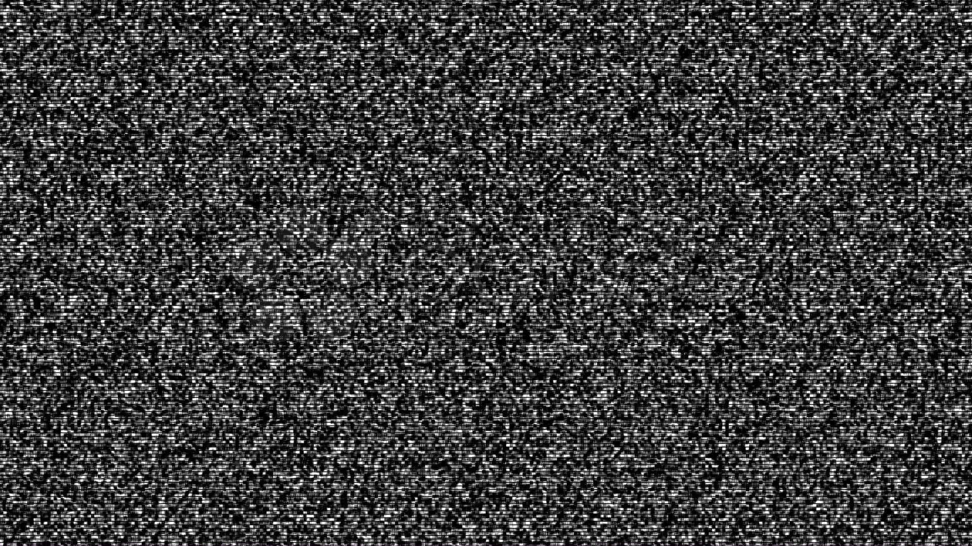 White Noise 桌布 壁紙 — 充滿靜電的黑白電視螢幕，帶有顆粒狀噪聲圖案。