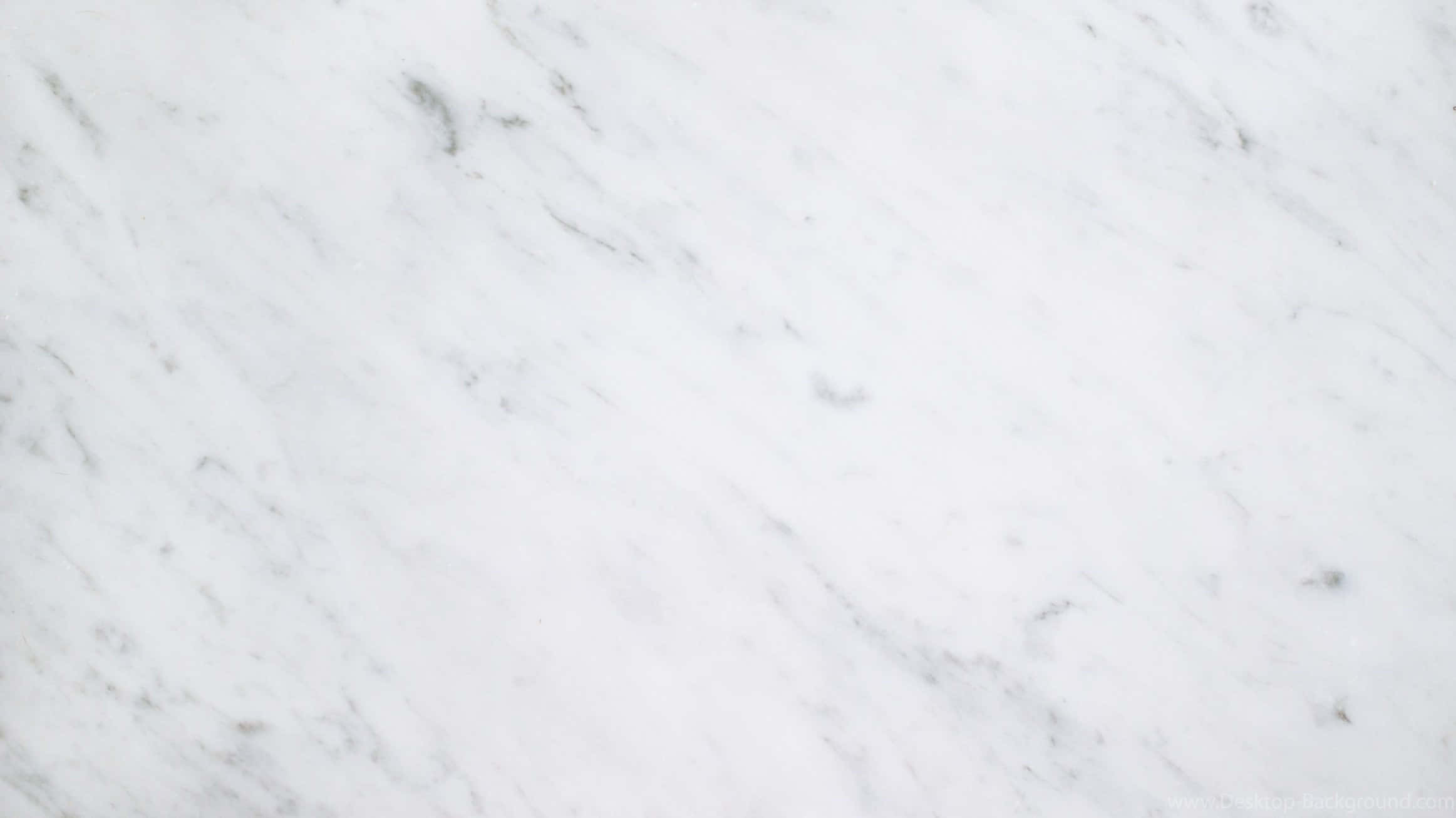 White Marble 桌布 壁紙 — 光滑白色大理石的近距離特寫，優雅的灰色紋理對角流過表面。