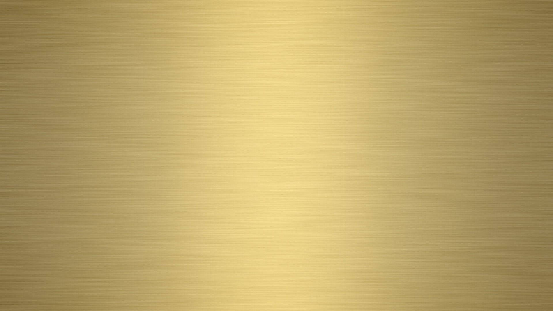 Foil 桌布 壁紙 — 光滑的拉絲金金屬表面，帶有微妙的水平線條和柔和漸變照明。