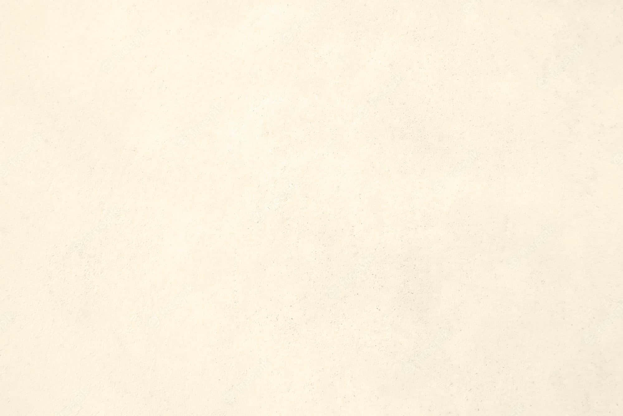 Plain Beige 桌布 壁紙 — 光滑的米白色紋理表面，整個畫面帶有細微斑點和柔和漸變。