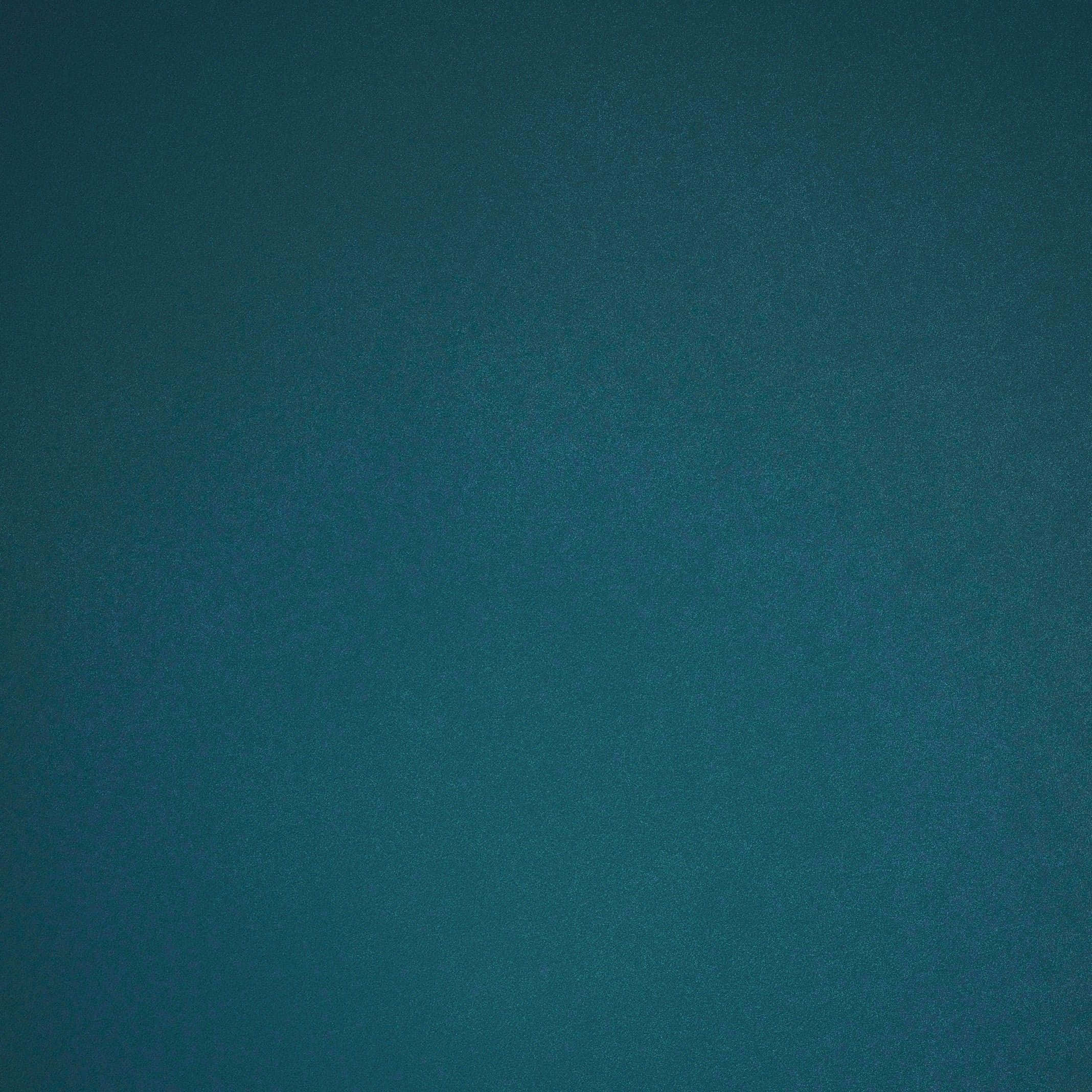 Dark Teal 桌布 壁紙 — 光滑青綠色布料的特寫，帶有細微紋理和漸變照明。
