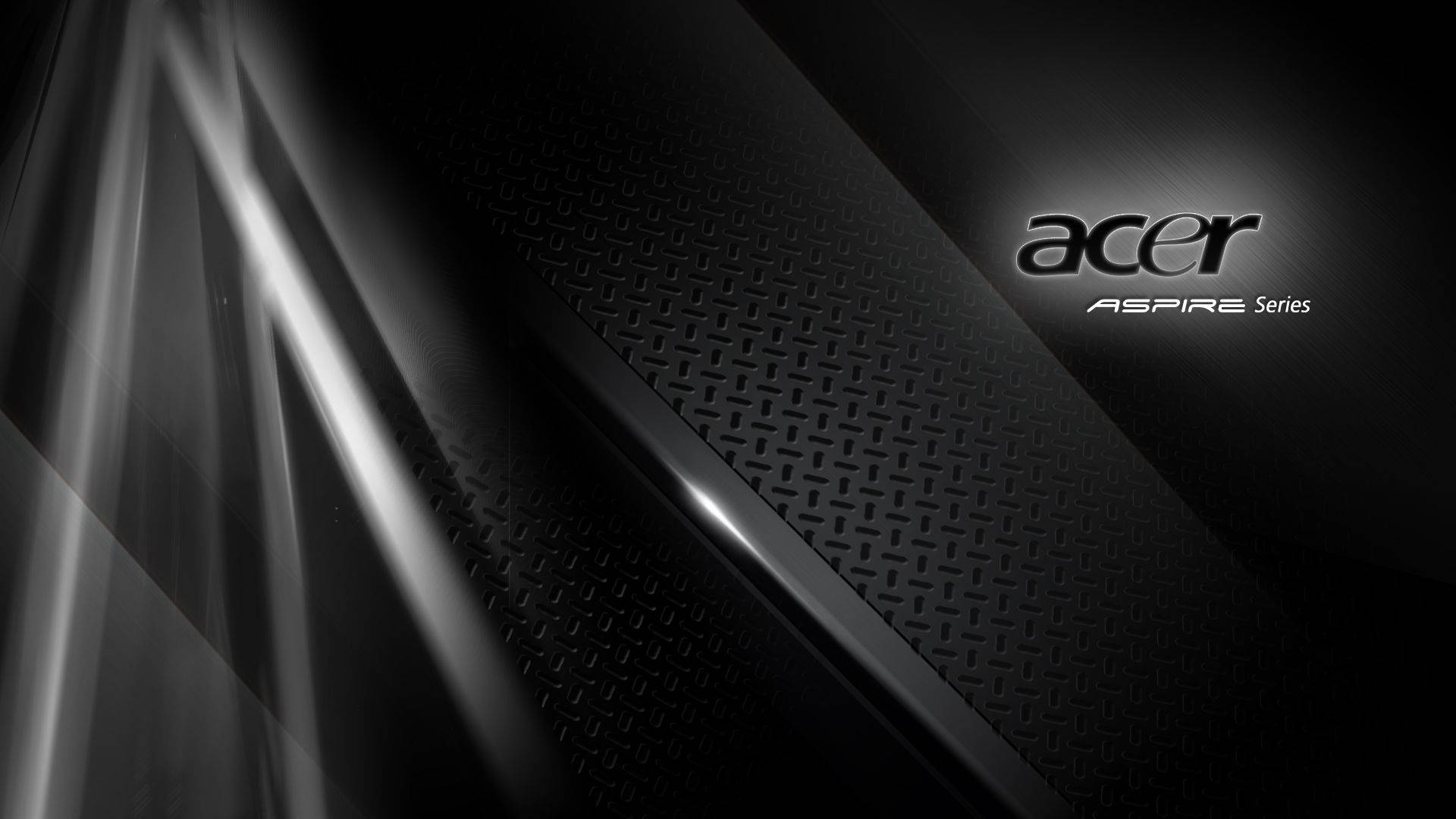Metallic 桌布 壁紙 — 光滑黑色Acer Aspire系列筆記型電腦，帶有紋理鑽石板飾面和閃爍的銀色光條。