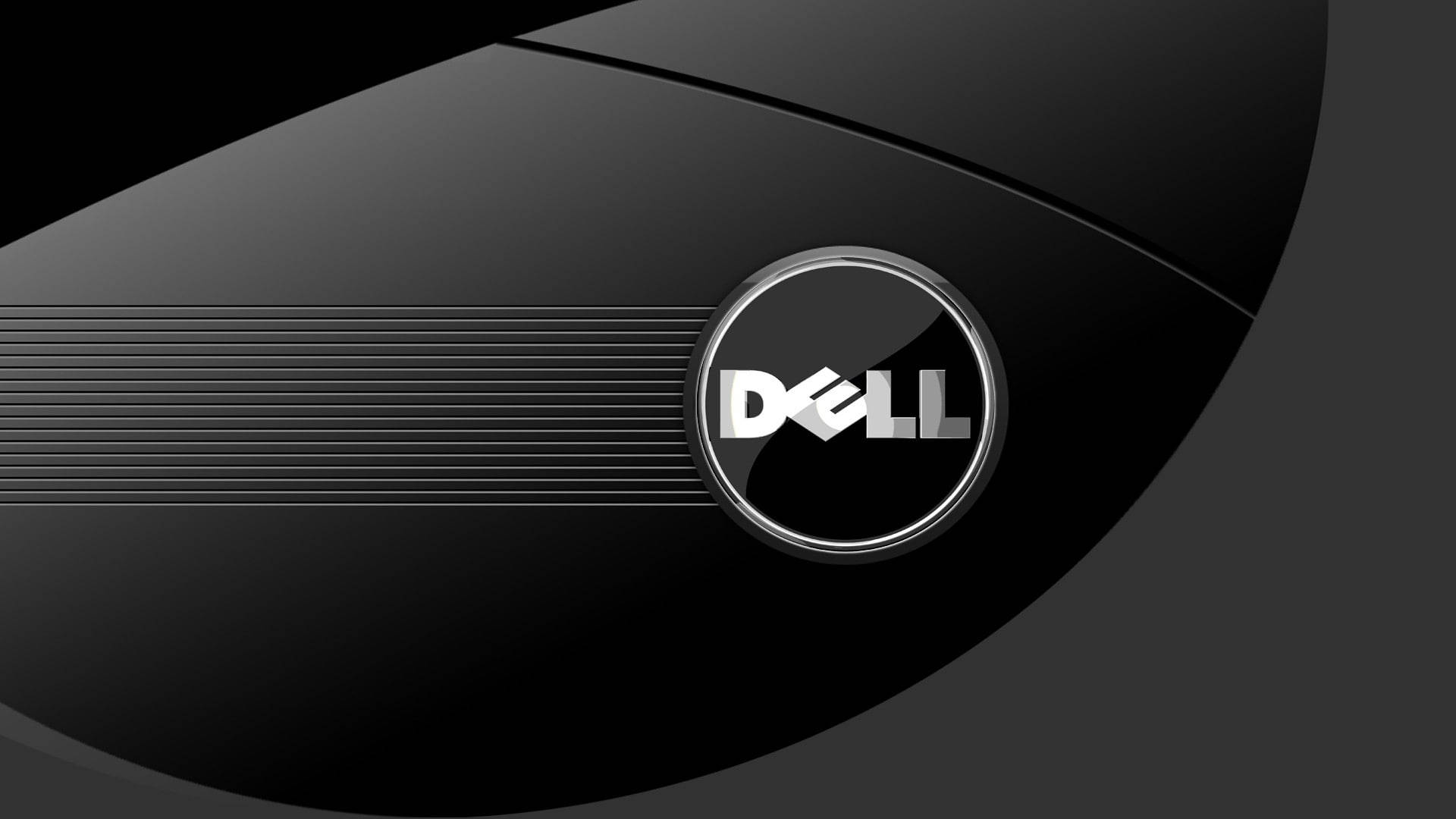 Dell Laptop 桌布 壁紙 — 光滑黑色曲面中央有銀色Dell標誌，置於水平線之上，帶有光澤反射。
