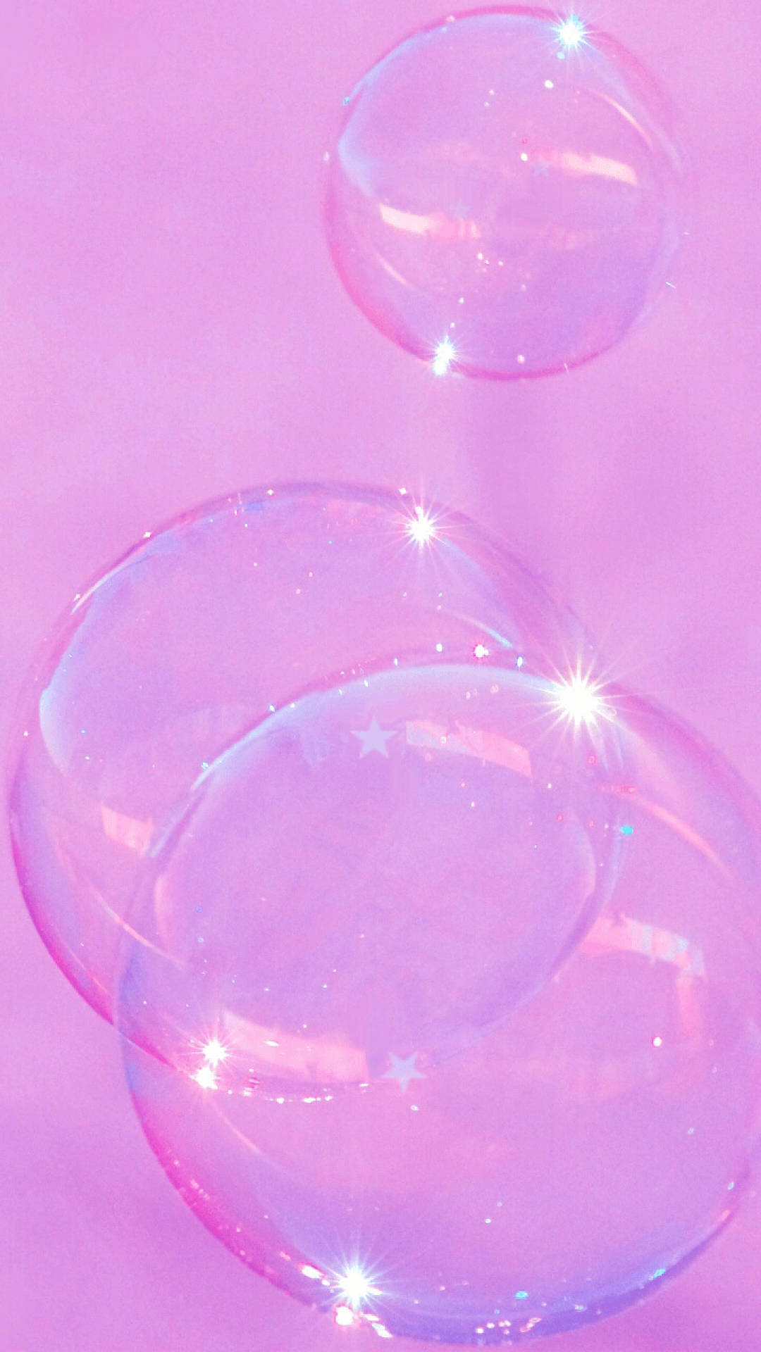 Bubbles 桌布 壁紙 — 光澤粉紅泡泡漂浮在柔和的薰衣草背景上，帶有閃爍星光反射。