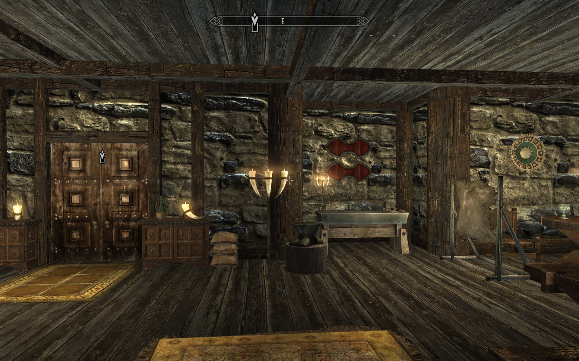 Skyrim Windhelm 桌布 壁紙 — 光線昏暗的質樸石木室內設計，木地板、火炬和中世紀家具。