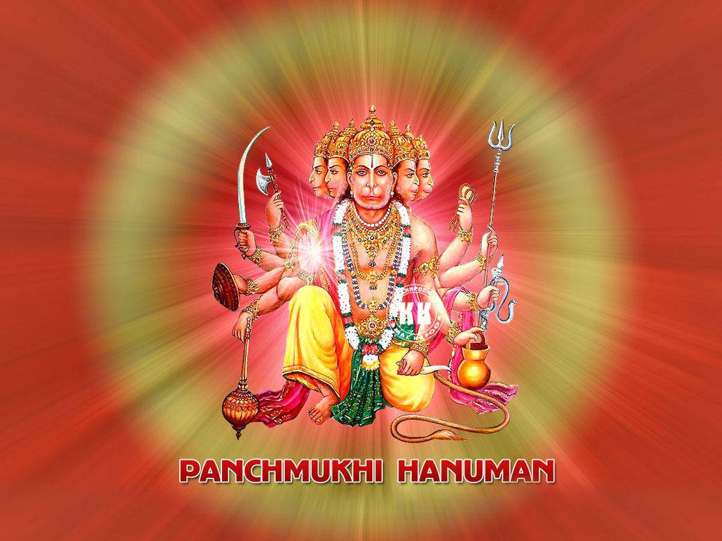 lord hanuman 桌布 壁紙 — 光芒四射的多頭哈努曼，戴著金色皇冠，手持武器，盤腿坐在紅黃放射狀背景前。