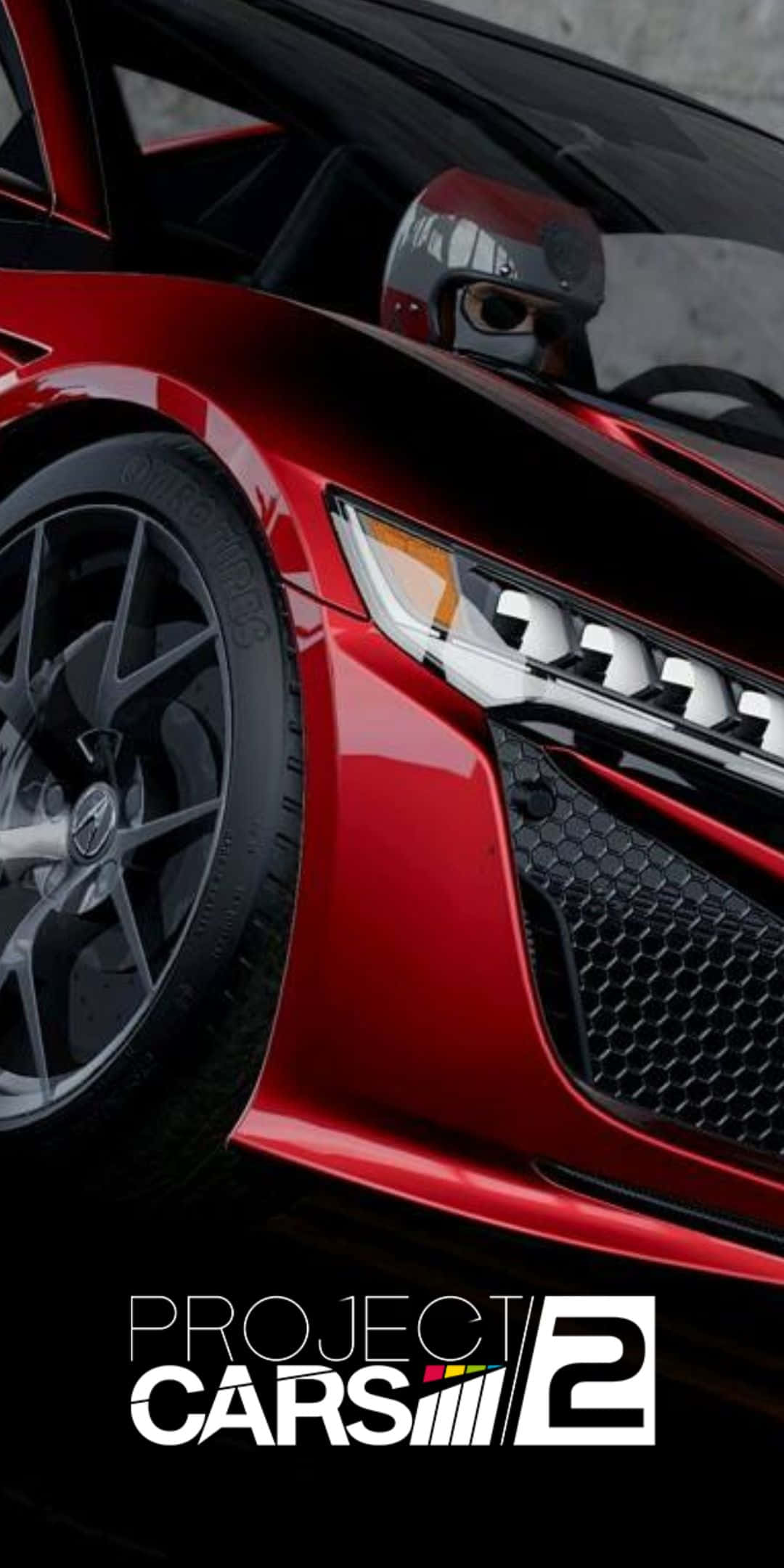Pixel 3 Project Cars 2 桌布 壁紙 — 光面紅色賽車左前角的特寫，透過擋風玻璃可見戴頭盔的車手。