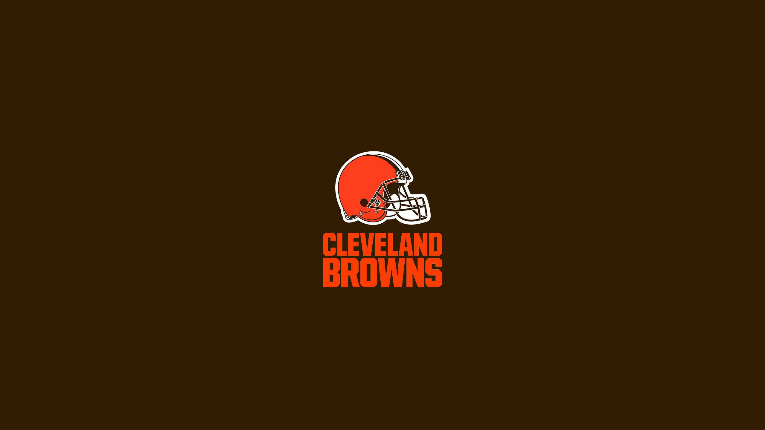 克里夫蘭布朗 桌布 壁紙 — 克里夫蘭布朗隊標誌居中於純棕色背景上，帶有粗體橙色文字和頭盔。
