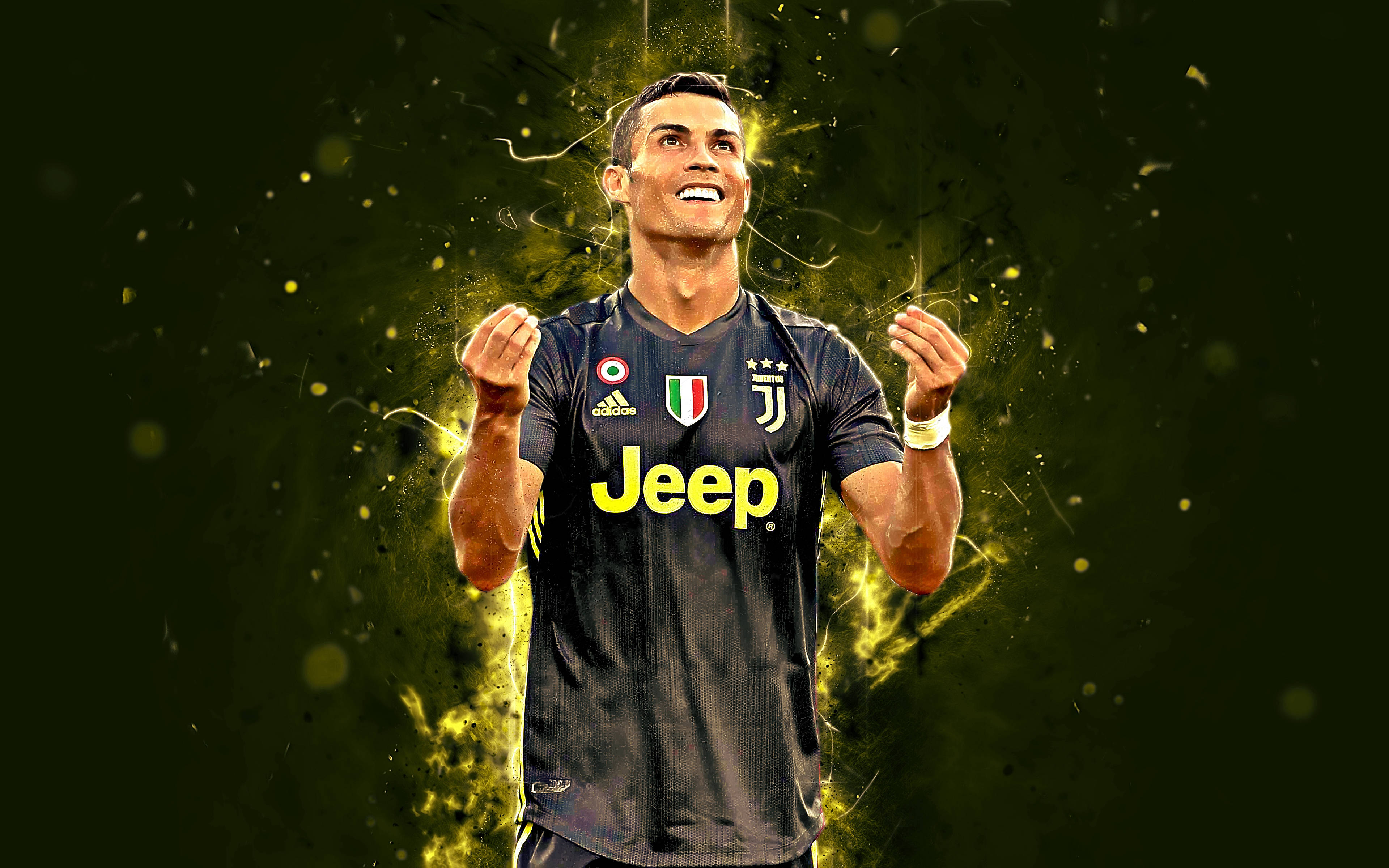 Ronaldo 桌布 壁紙 — 克里斯蒂亞諾·羅納度身穿尤文圖斯球衣慶祝，金色能量粒子在他周圍爆發，背景為深綠色。