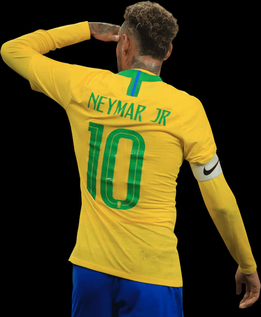 足球員 桌布 壁紙 — 內馬爾（Neymar Jr）身穿巴西黃色10號球衣，背對鏡頭向黑色背景敬禮。