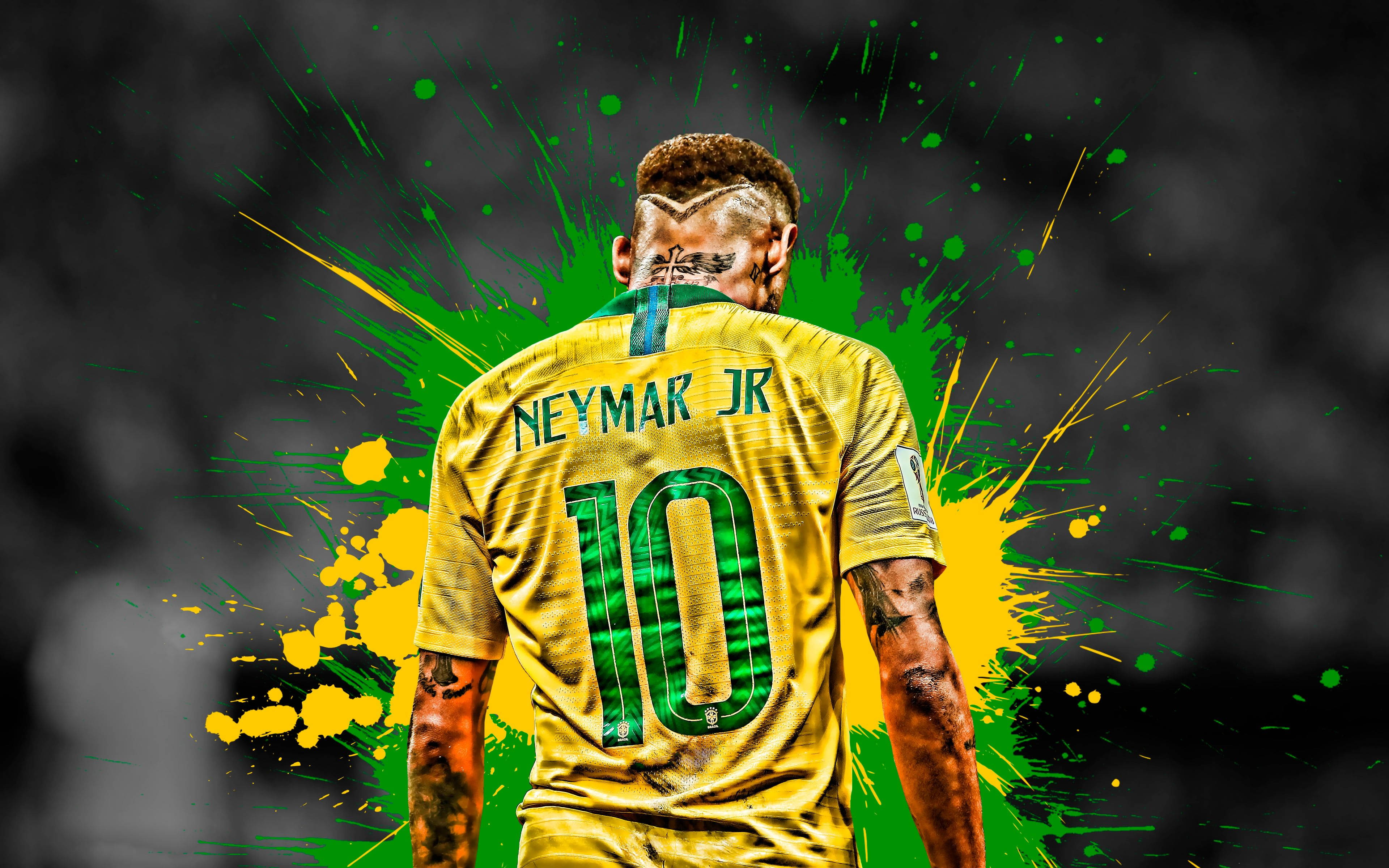 足球 桌布 壁紙 — 內馬爾（Neymar Jr）身穿黃色巴西10號球衣的背影，周圍是充滿活力的綠色和黃色油漆飛濺。