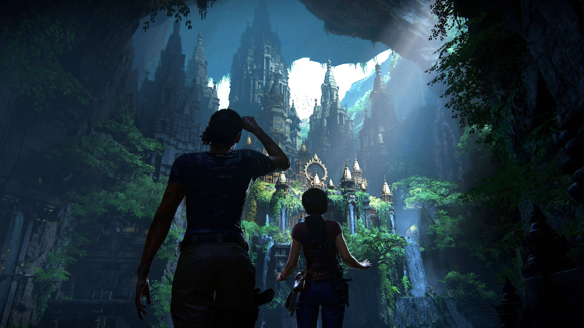 兩位探險家站在叢林洞穴中一座發光的古老遺跡前。 — Ps4 壁紙