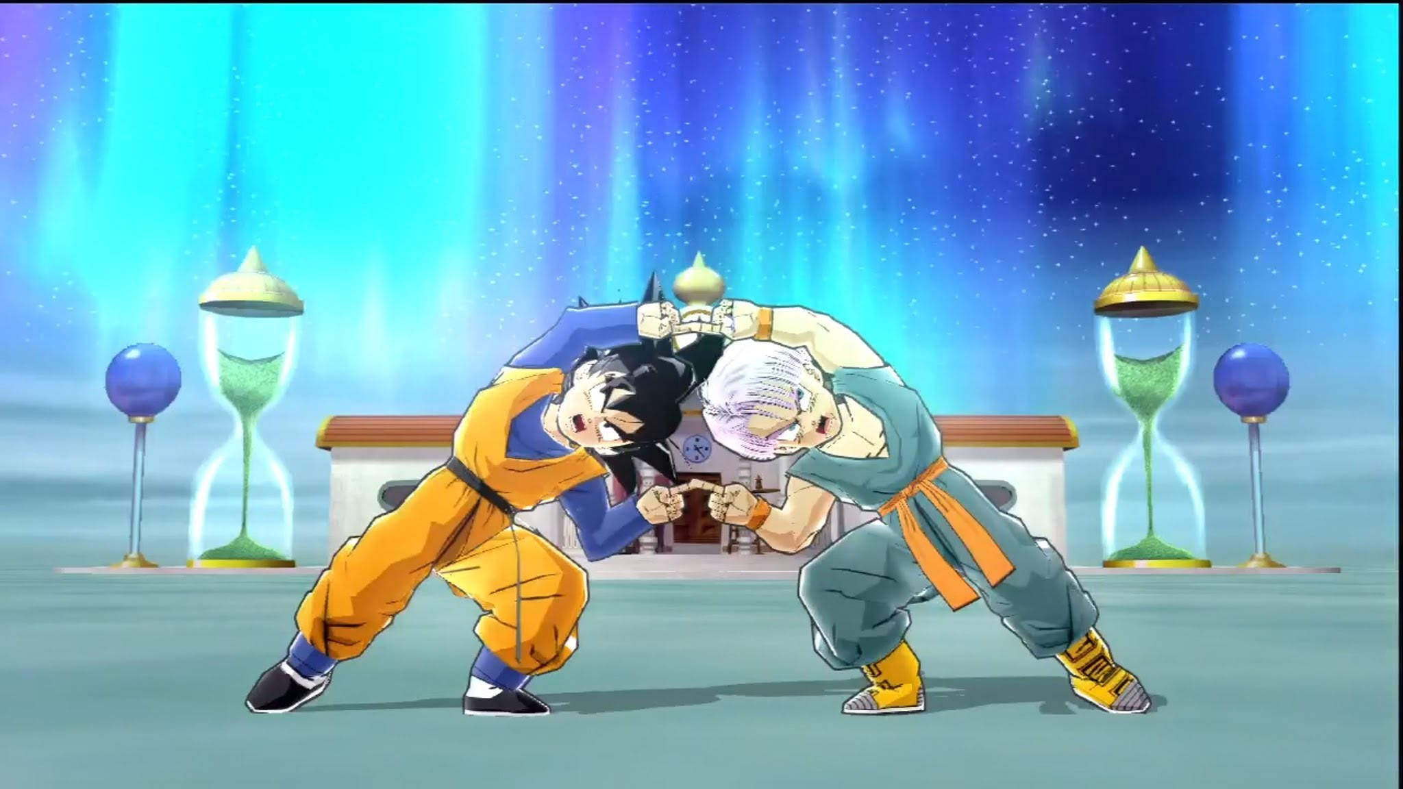 Goten 桌布 壁紙 — 兩位動漫戰士在閃耀的競技場中交鋒，上方是繁星點點的極光天空，兩側各有一個沙漏計時器。