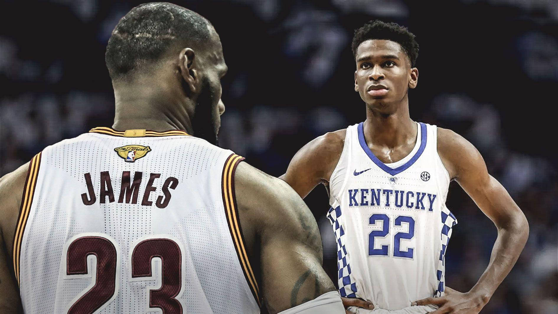 Shai Gilgeous Alexander 桌布 壁紙 — 兩位籃球運動員在緊張的球場上對峙，一位身穿克里夫蘭球衣，另一位身穿肯塔基球衣。