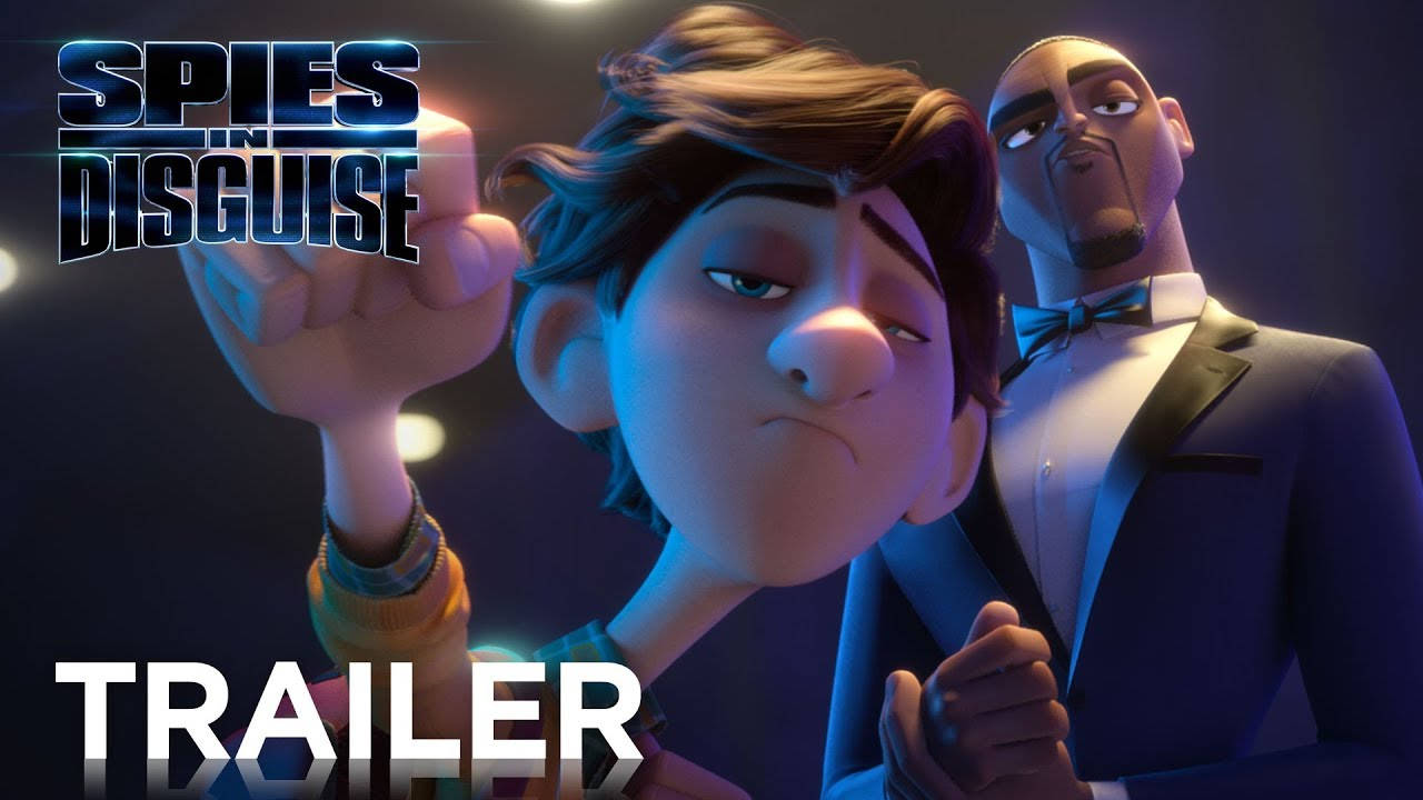 Spies In Disguise 桌布 壁紙 — 兩位身穿禮服的動畫間諜在藍色舞台燈光下以『Spies in Disguise』標題戲劇性地擺姿勢。