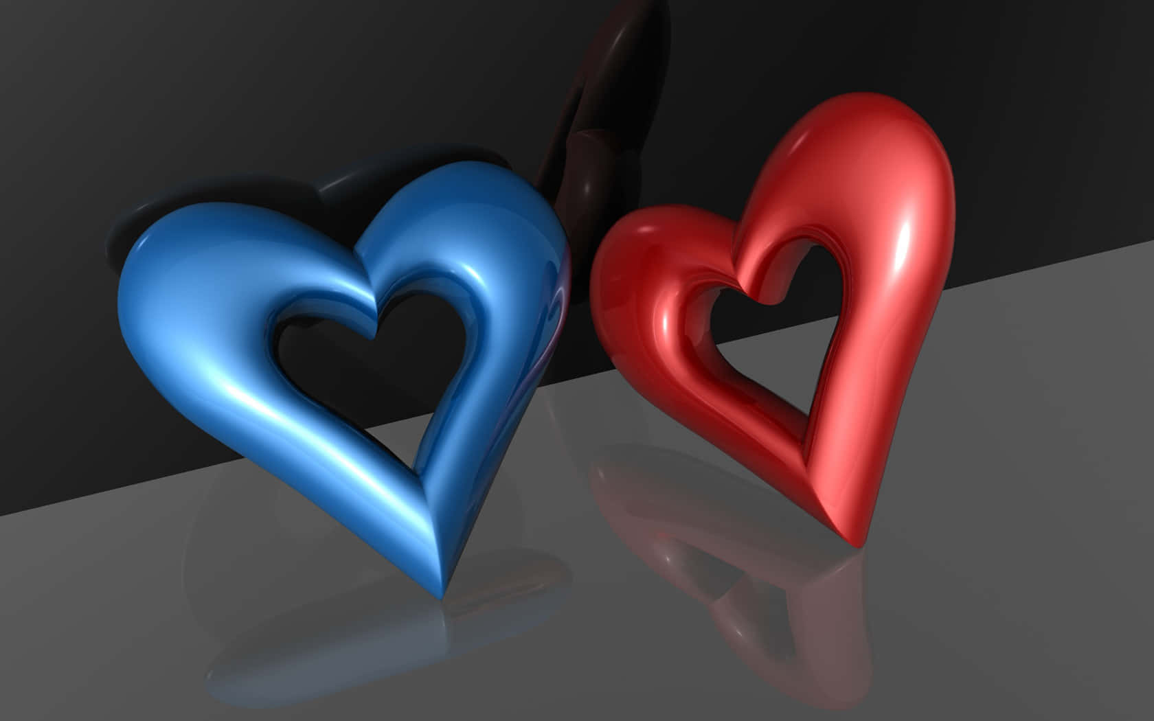 Heart Shape 桌布 壁紙 — 兩個光滑的3D心形，一個藍色一個紅色，放在反光表面上，在深色背景下投射出柔和陰影。