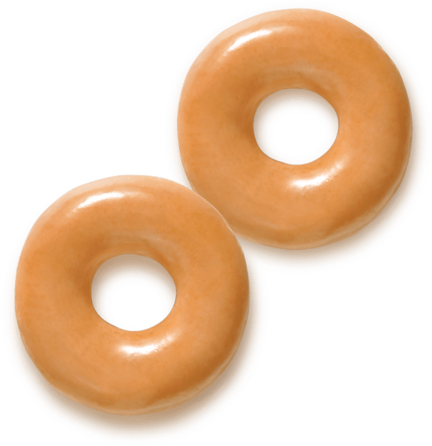 Donut 桌布 壁紙 — 兩個光滑的焦糖色釉面甜甜圈放在純黑色背景上。