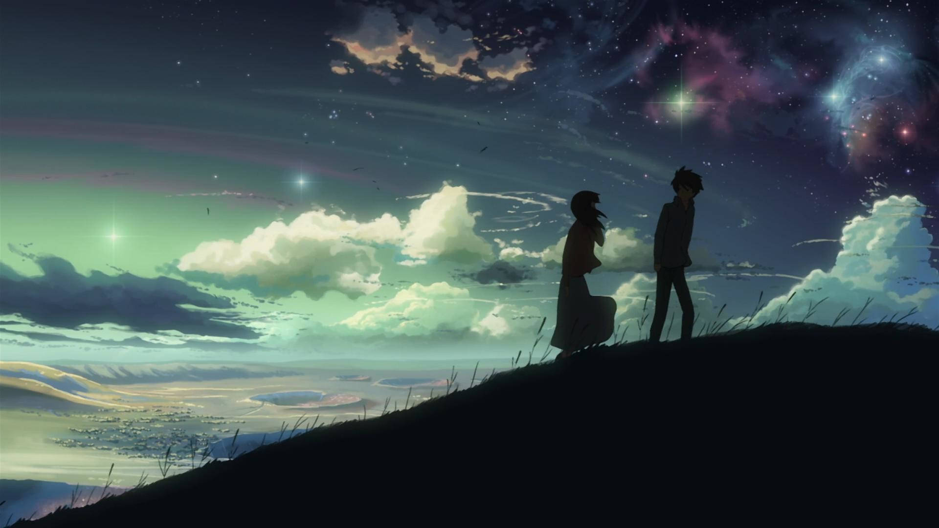 HD Scenery 桌布 壁紙 — 兩個剪影人物站在山頂上，凝視著充滿宇宙雲和發光星雲的鮮豔星空。