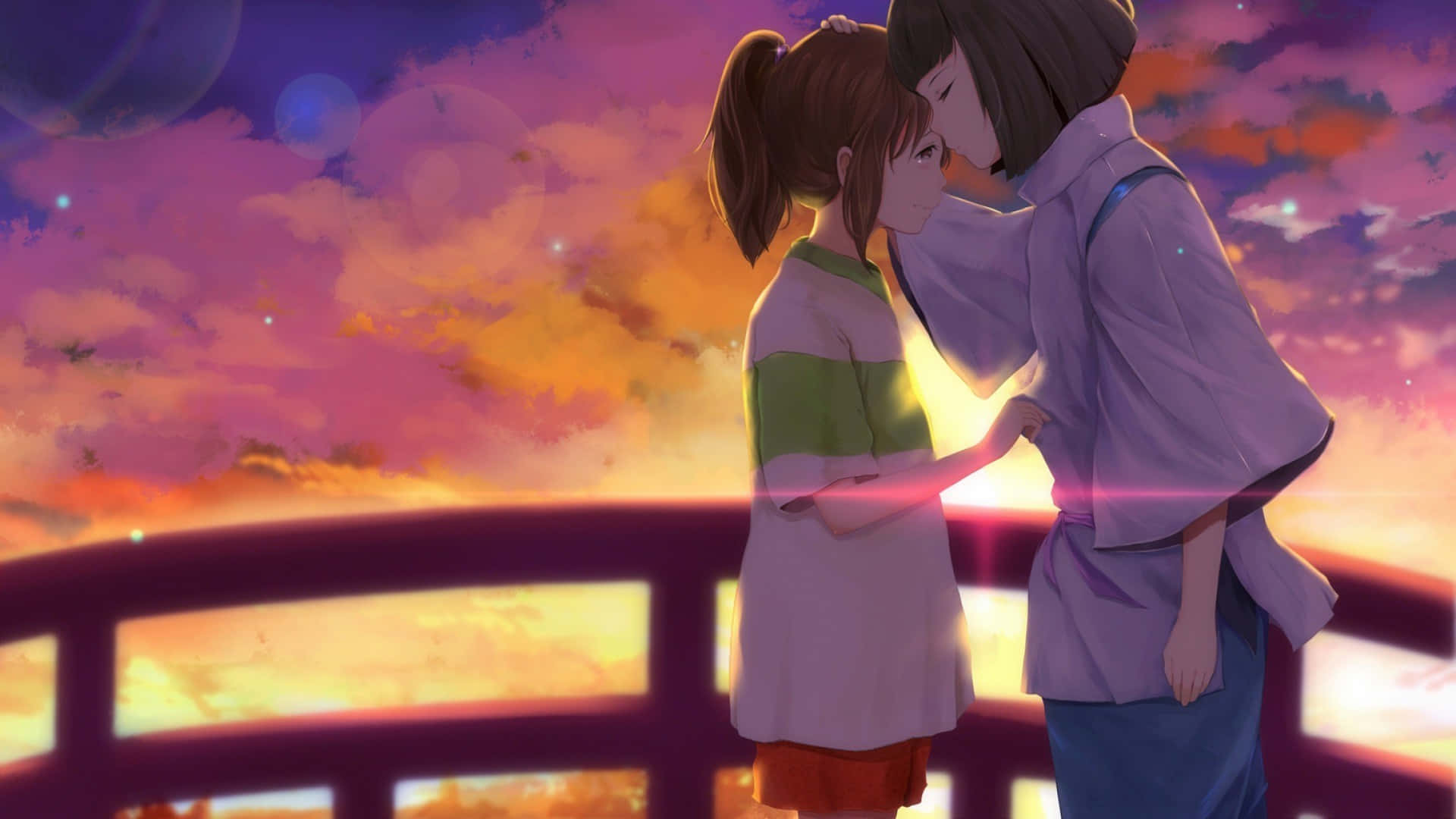 Aesthetic Ghibli 桌布 壁紙 — 兩個動漫女孩在橋上分享溫馨時刻，夕陽燦爛，天空染上粉紅、橙和紫色調。