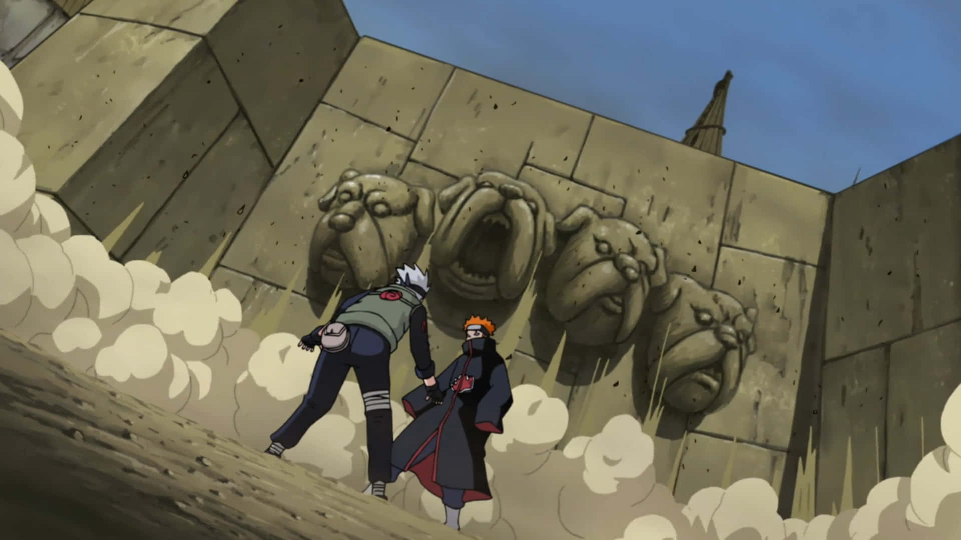 Kakashi And Pain 桌布 壁紙 — 兩個動漫忍者站在一面刻有咆哮獅頭的巨型石牆前，灰塵在他們腳邊旋轉。