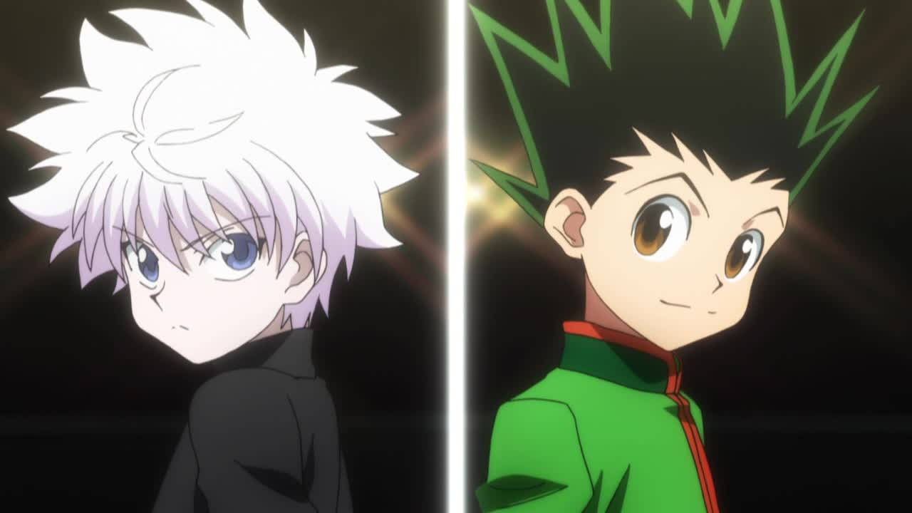 Gon And Killua 桌布 壁紙 — 兩個動漫男孩，頭髮尖尖，在黑暗背景前，帶有發光效果，面對面。