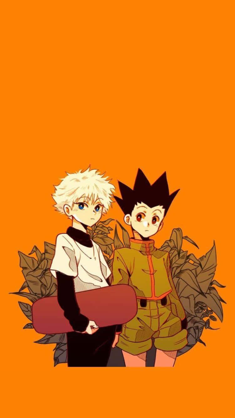獵人 x 獵人 桌布 壁紙 — 兩個動漫男孩，頭髮尖尖，站在純橙色背景前，周圍環繞著棕色樹葉。