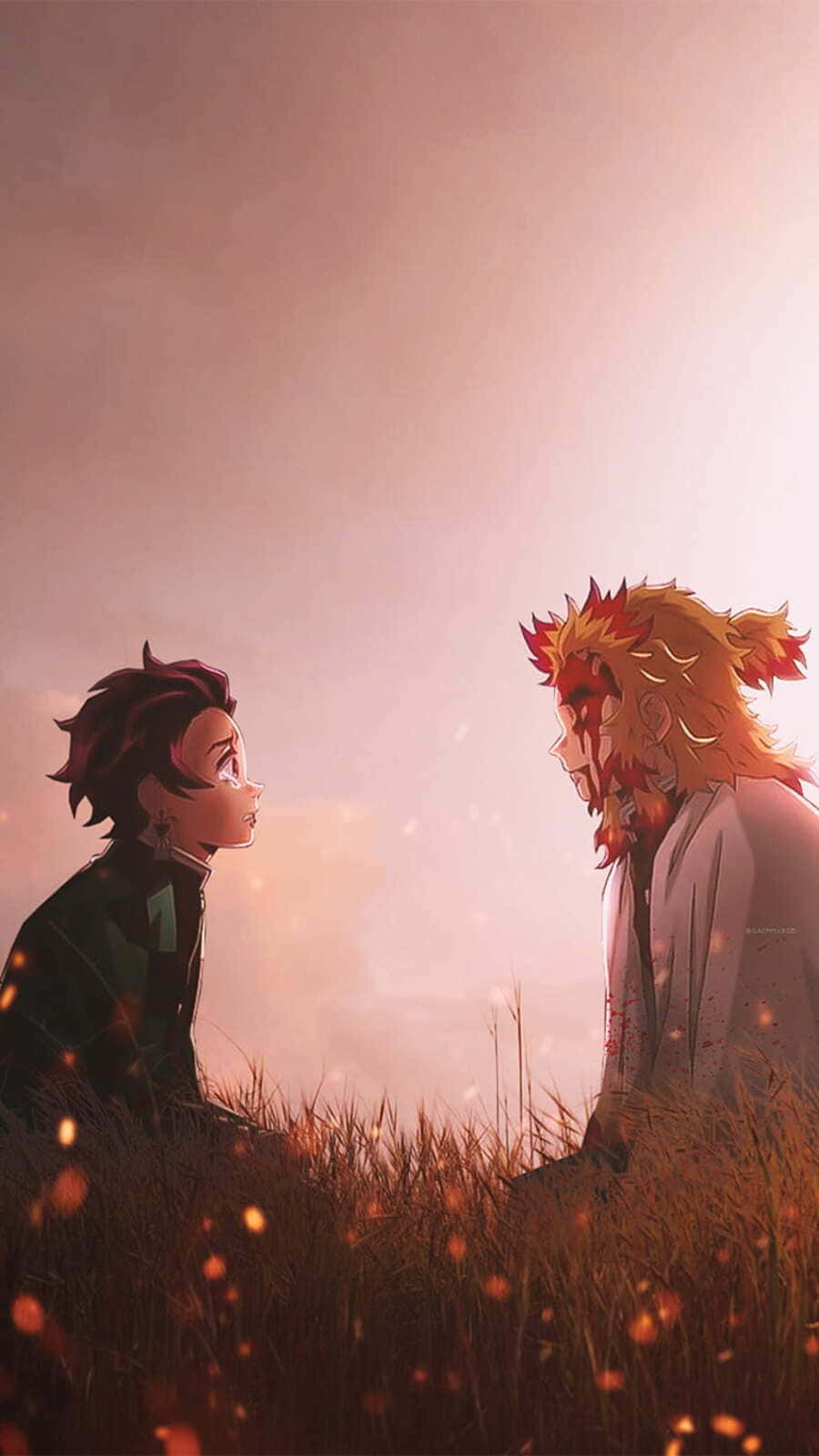 Rengoku And Tanjiro 桌布 壁紙 — 兩個動漫角色在高草叢中面對面坐在溫暖發光的天空下，有浮動的火花。