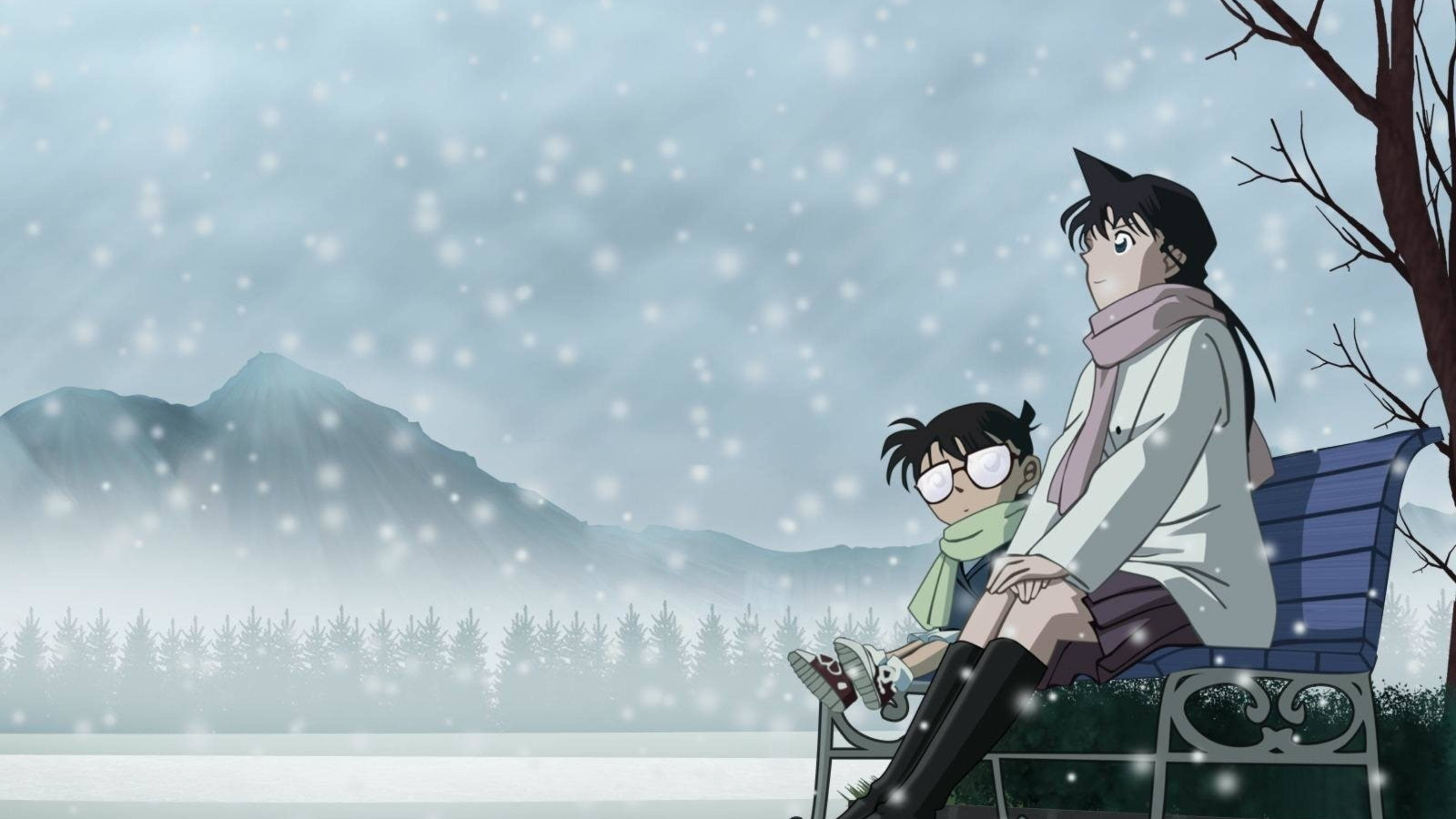 conan 桌布 壁紙 — 兩個動漫角色坐在長椅上，背景有山脈和樹木，雪花飄落。