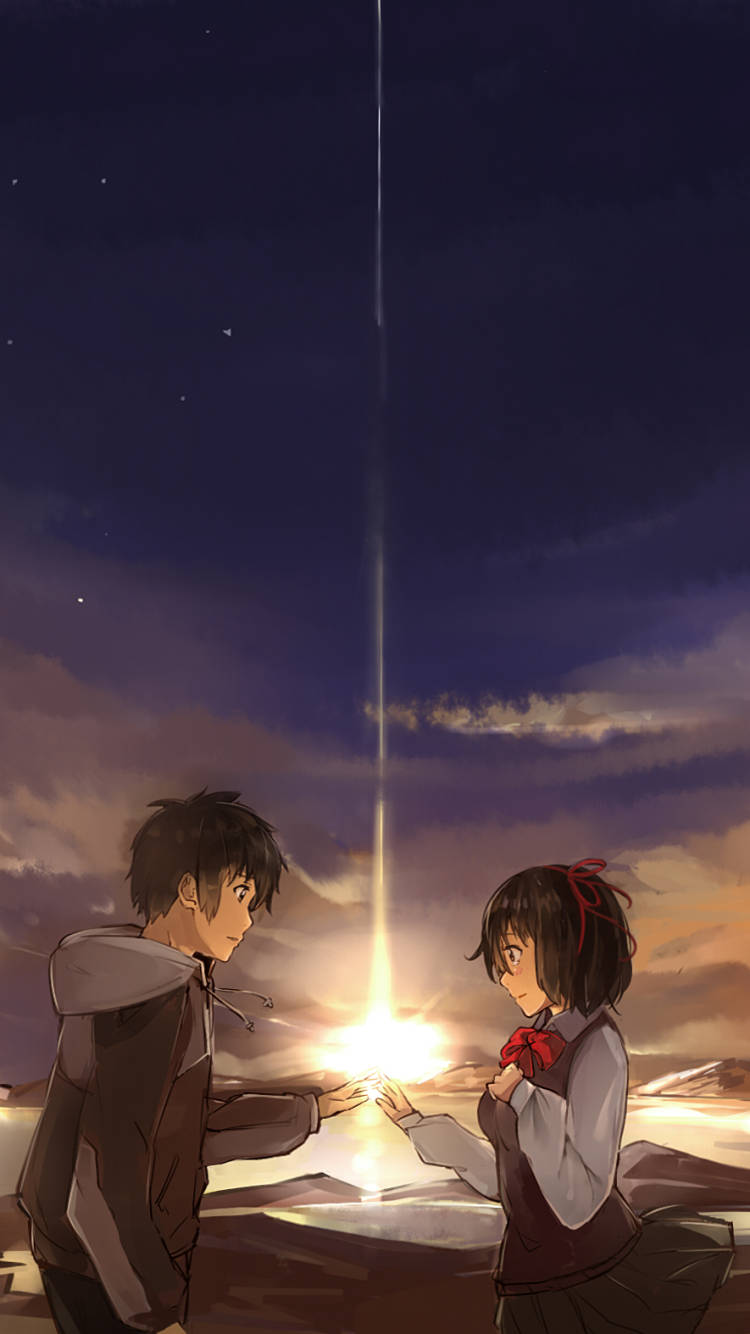 Your Name Anime 桌布 壁紙 — 兩個動漫青少年伸手觸碰一道穿透繁星暮空的光芒。