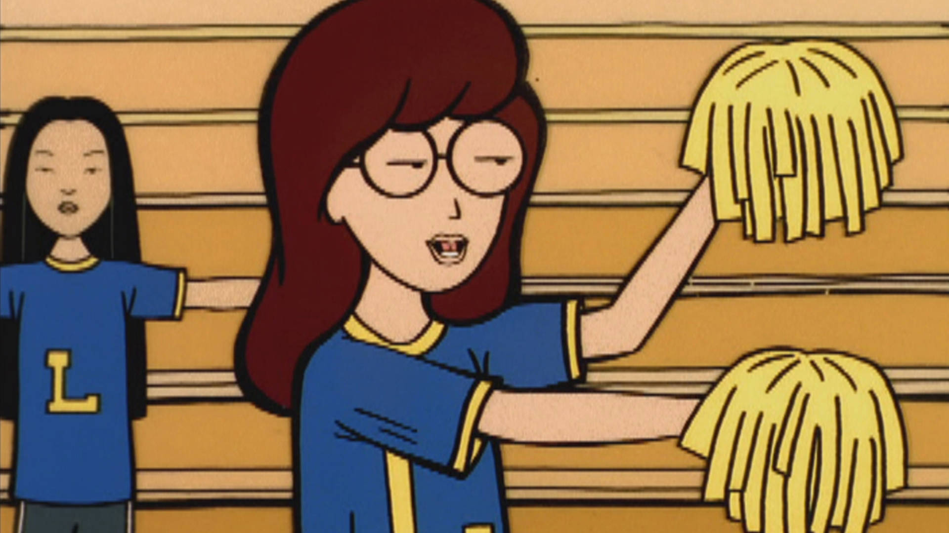 Daria 桌布 壁紙 — 兩個動畫啦啦隊員穿著藍色制服，拿著黃色絨球，在木製看臺上表演。