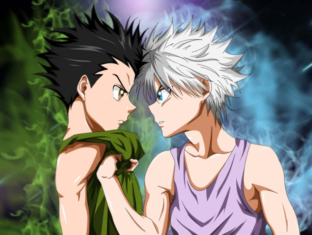 Gon And Killua 桌布 壁紙 — 兩個動畫男孩面對面，表情強烈，背景是旋轉的綠色和藍色能量。