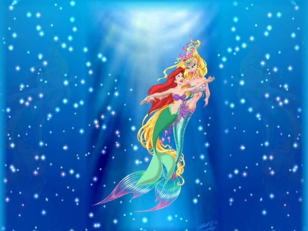 美人魚 桌布 壁紙 — 兩個動畫美人魚，擁有飄逸的頭髮和色彩繽紛的尾巴，優雅地游過一個閃閃發光的藍色水下場景，沐浴在神聖的光芒中。