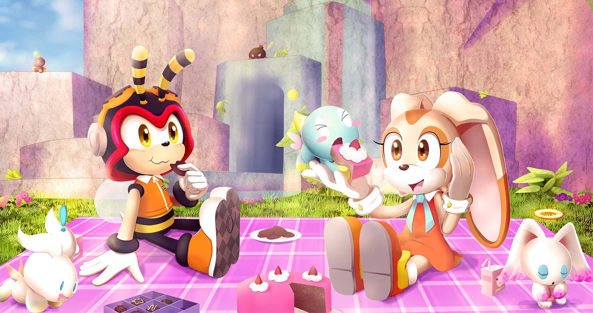Charmy Bee 桌布 壁紙 — 兩個動畫角色在充滿活力的幻想風景中，享受色彩繽紛的野餐，有甜點和小生物相伴。