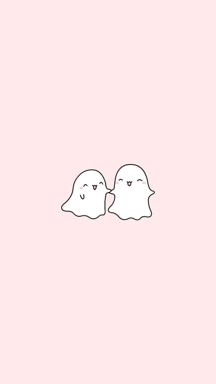 Cute Ghost 桌布 壁紙 — 兩個可愛的白色卡通鬼魂，臉頰泛紅，表情開心，在柔和的粉紅色背景上親吻。