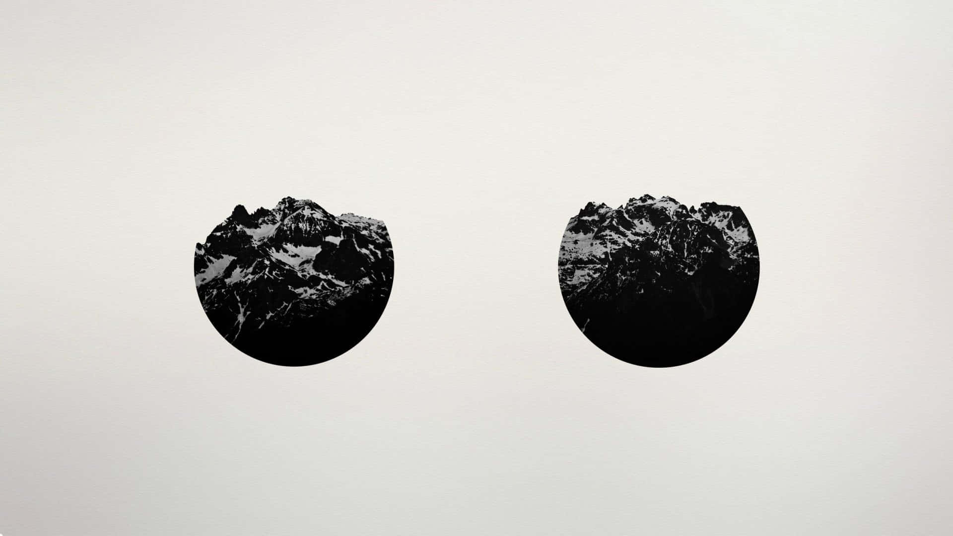 Aesthetic Black And White 桌布 壁紙 — 兩個圓形黑色山峰剪影，頂部有雪，漂浮在純淺灰色背景上。